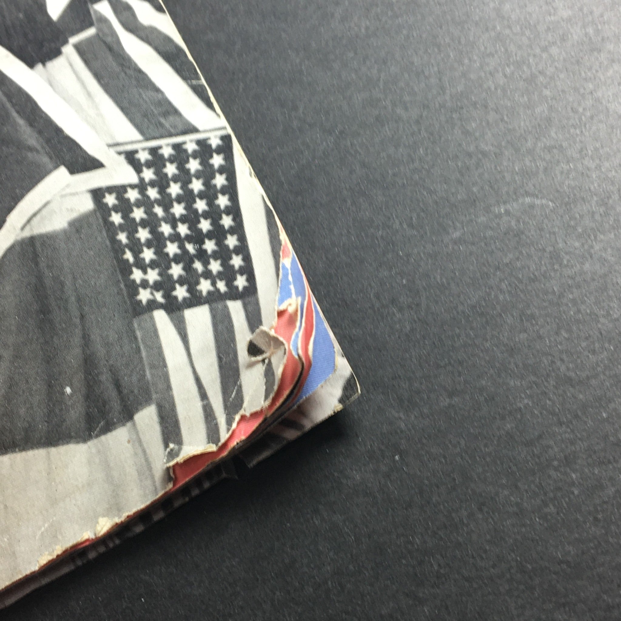 Close-up of the corner of the VTG Highlights Magazine July 27 1943, showing minor wear and vintage design featuring American flags.