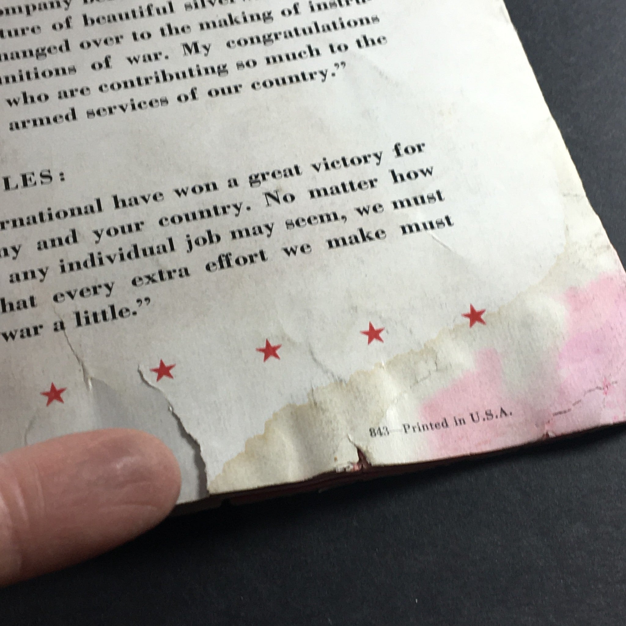 Detailed close-up of VTG Highlights Magazine July 27 1943 revealing a torn section with a message about the importance of individual contributions during wartime.