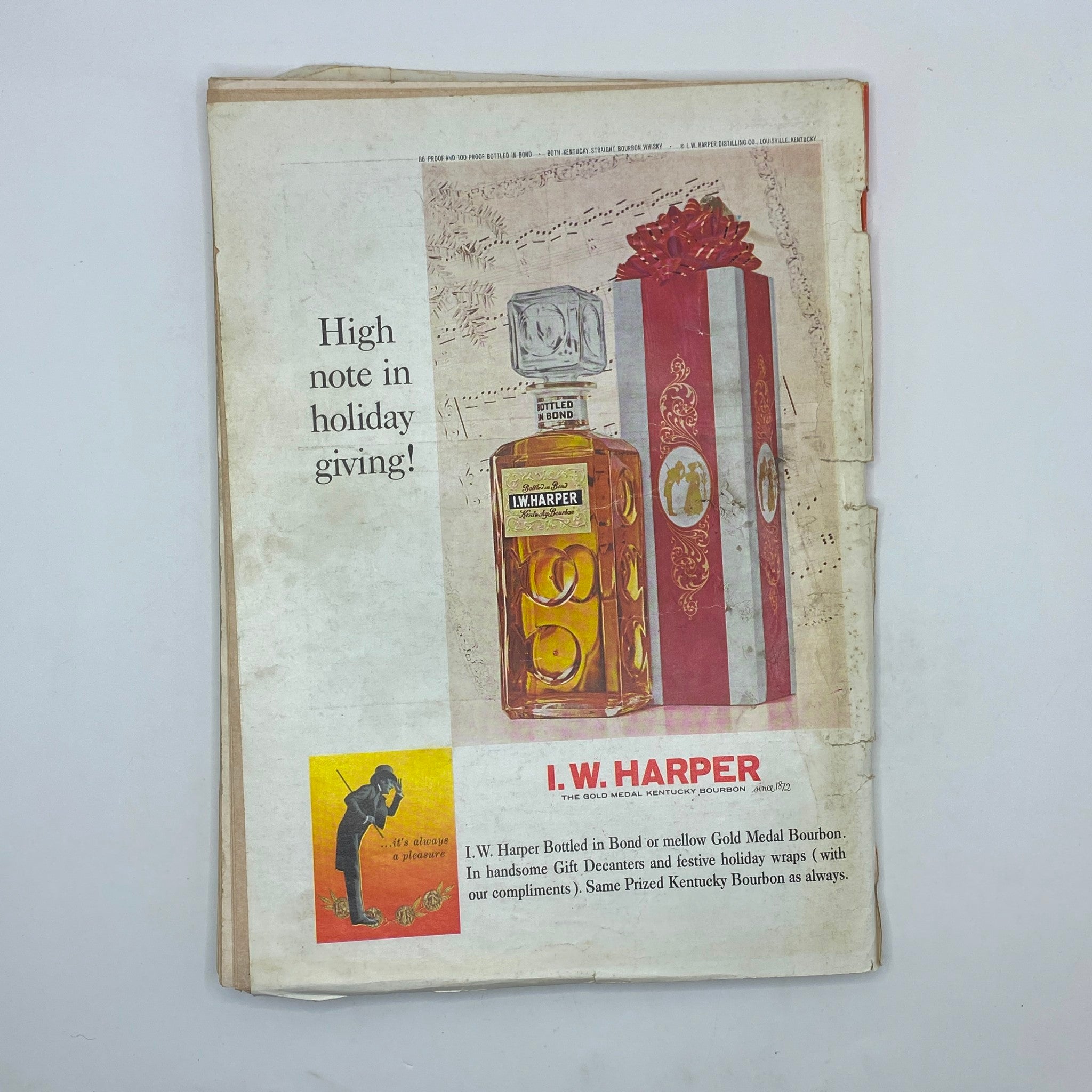 Back cover of The New Yorker magazine dated November 21, 1964, featuring an advertisement for I.W. Harper bourbon with a present theme for holiday gifting.