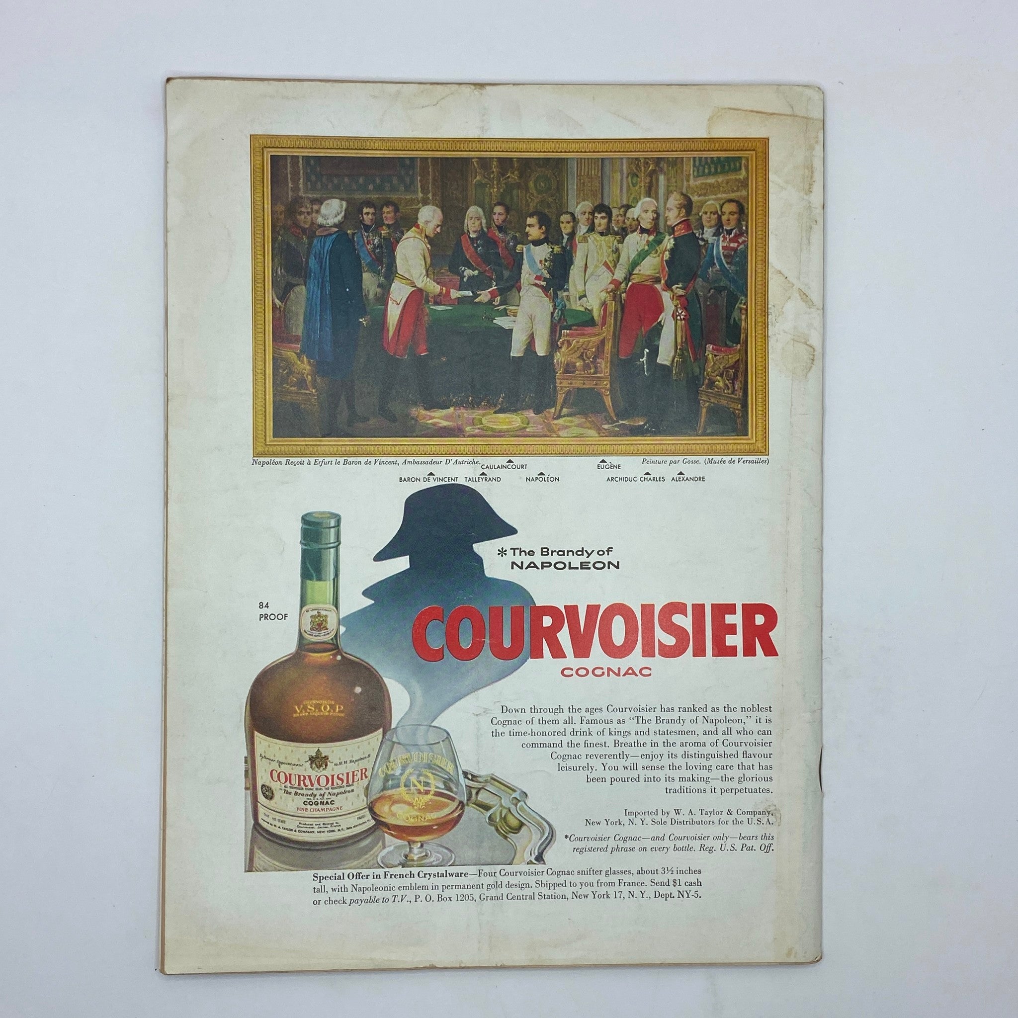 Advertisement for Courvoisier Cognac on the back cover of The New Yorker magazine from January 9, 1960, featuring a bottle and glass of cognac with an artistic background.