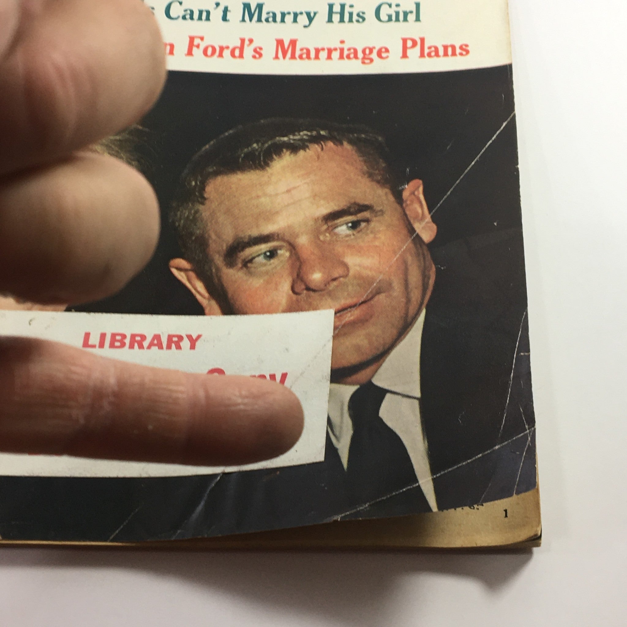 Close-up of VTG Hollywood Romances Magazine 1962 No. 17 cover, highlighting Elizabeth Taylor's feature and a library copy label.