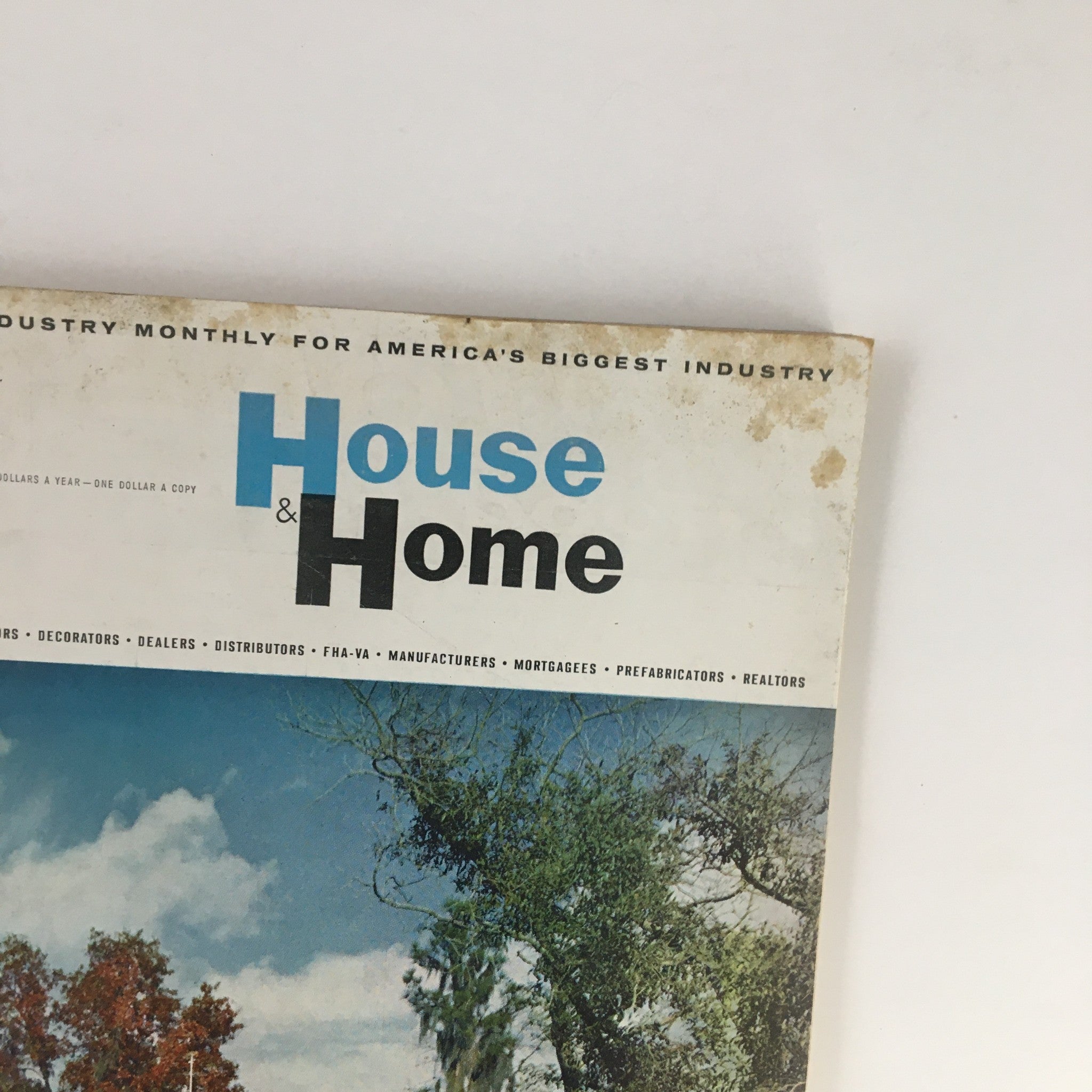 Cover of House & Home Magazine March 1957 featuring a Florida house by Tampa builder Abe Johns with visible wear and tear.