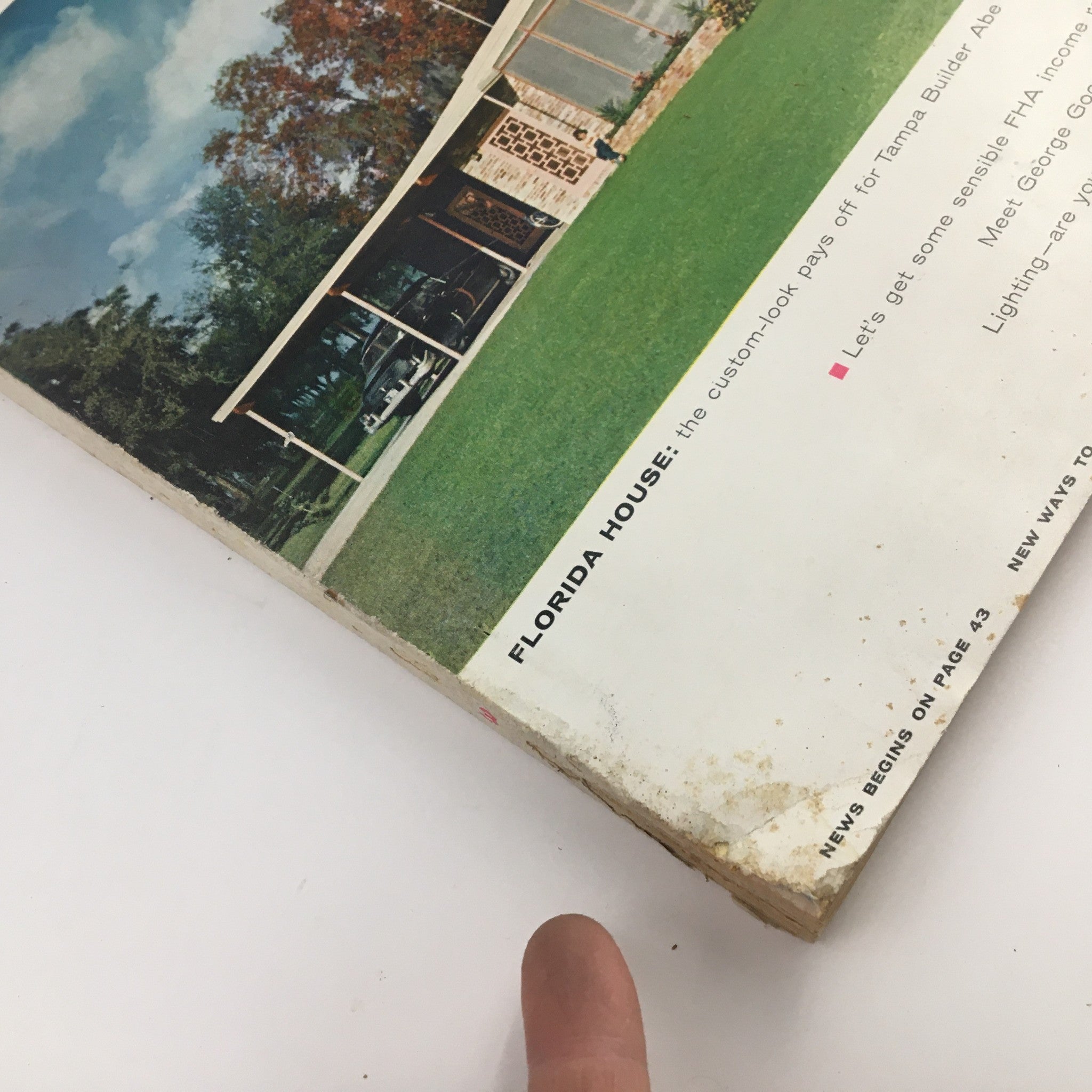 Side view of House & Home Magazine March 1957 highlighting the text 'FLORIDA HOUSE' with slight damage to the cover.