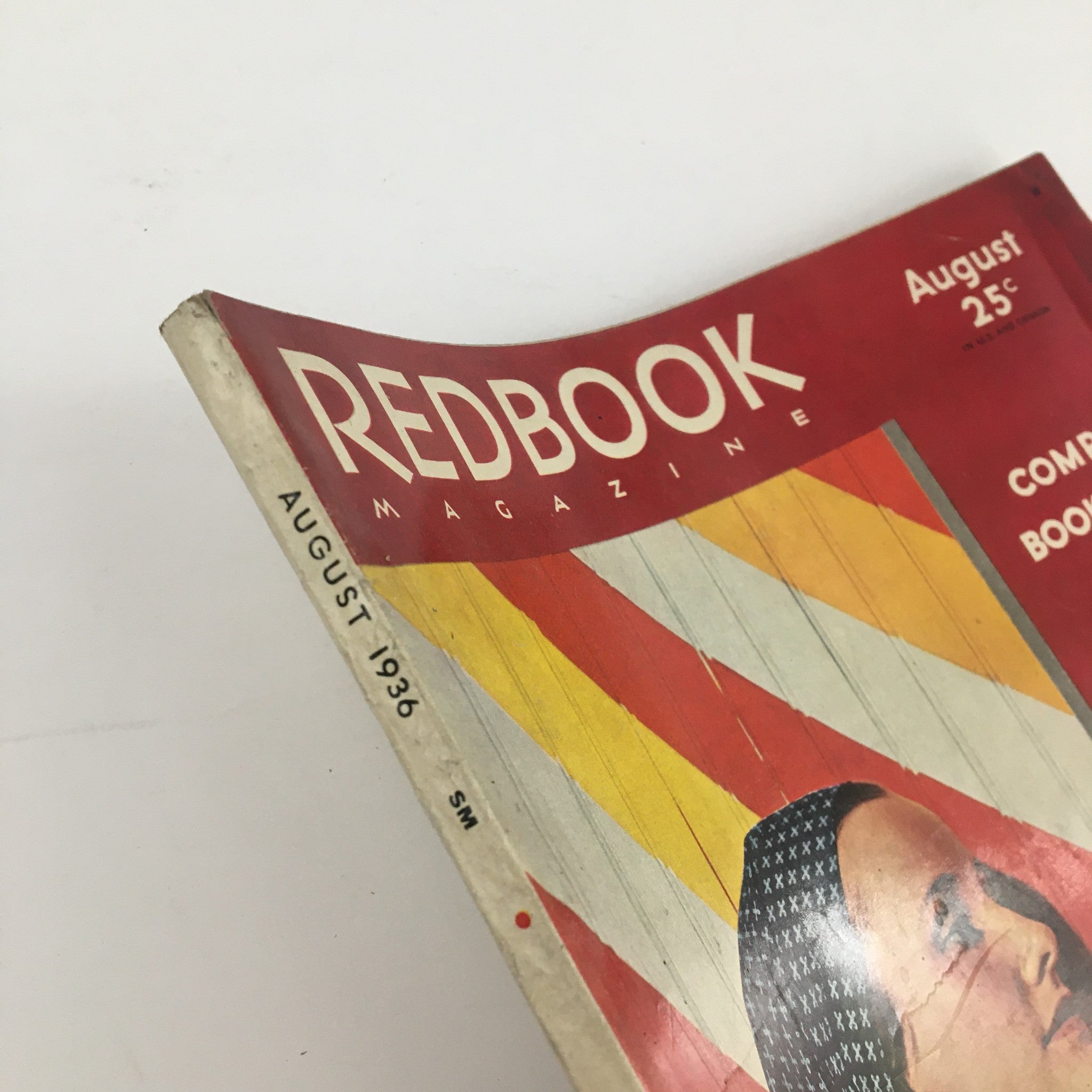 Side view of the VTG Redbook Magazine August 1936, displaying the publication date and magazine title alongside a vibrant cover design.