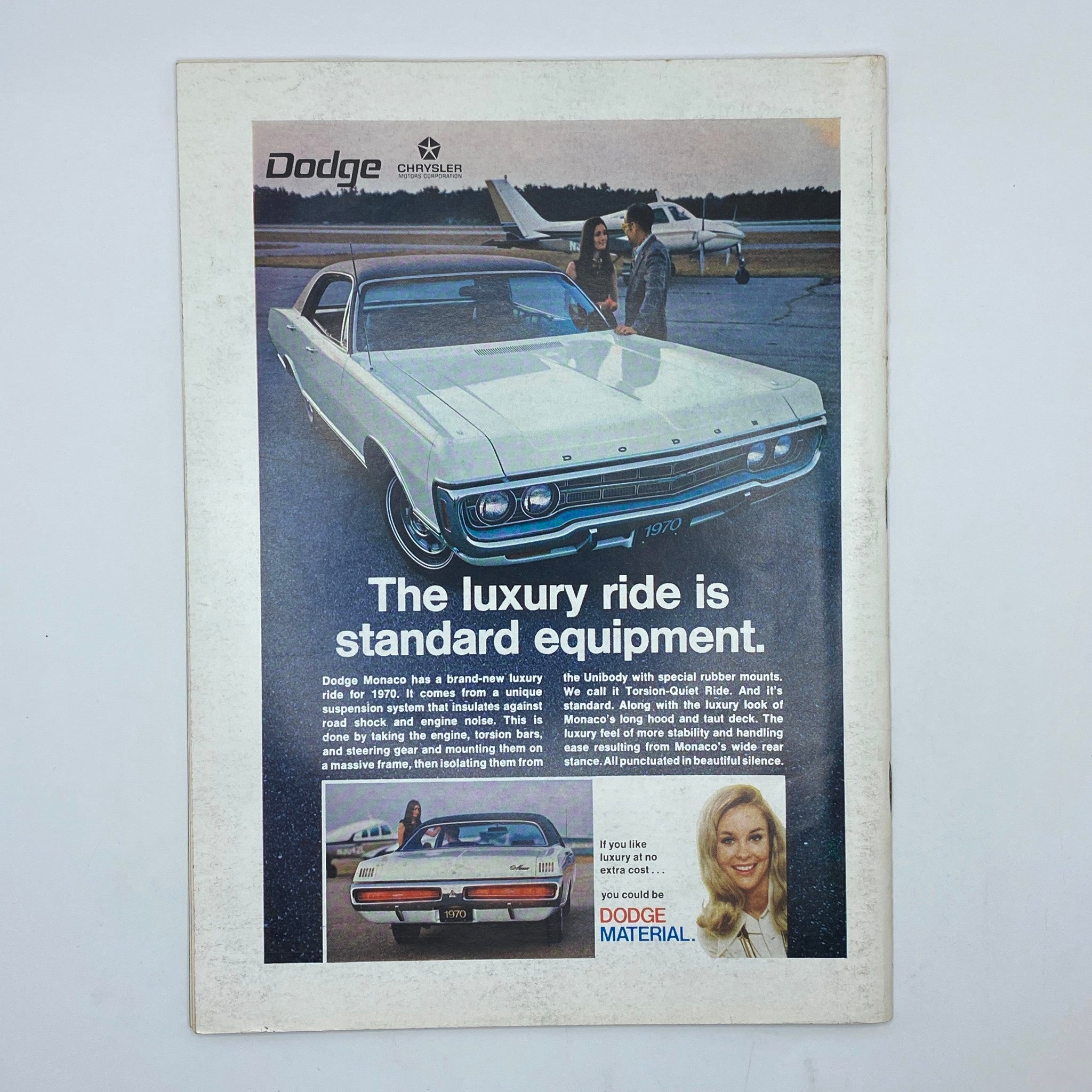 Advertisment for Dodge Monaco featured in The New Yorker magazine dated January 10, 1970, highlighting luxury features with a photo of the car and a model.