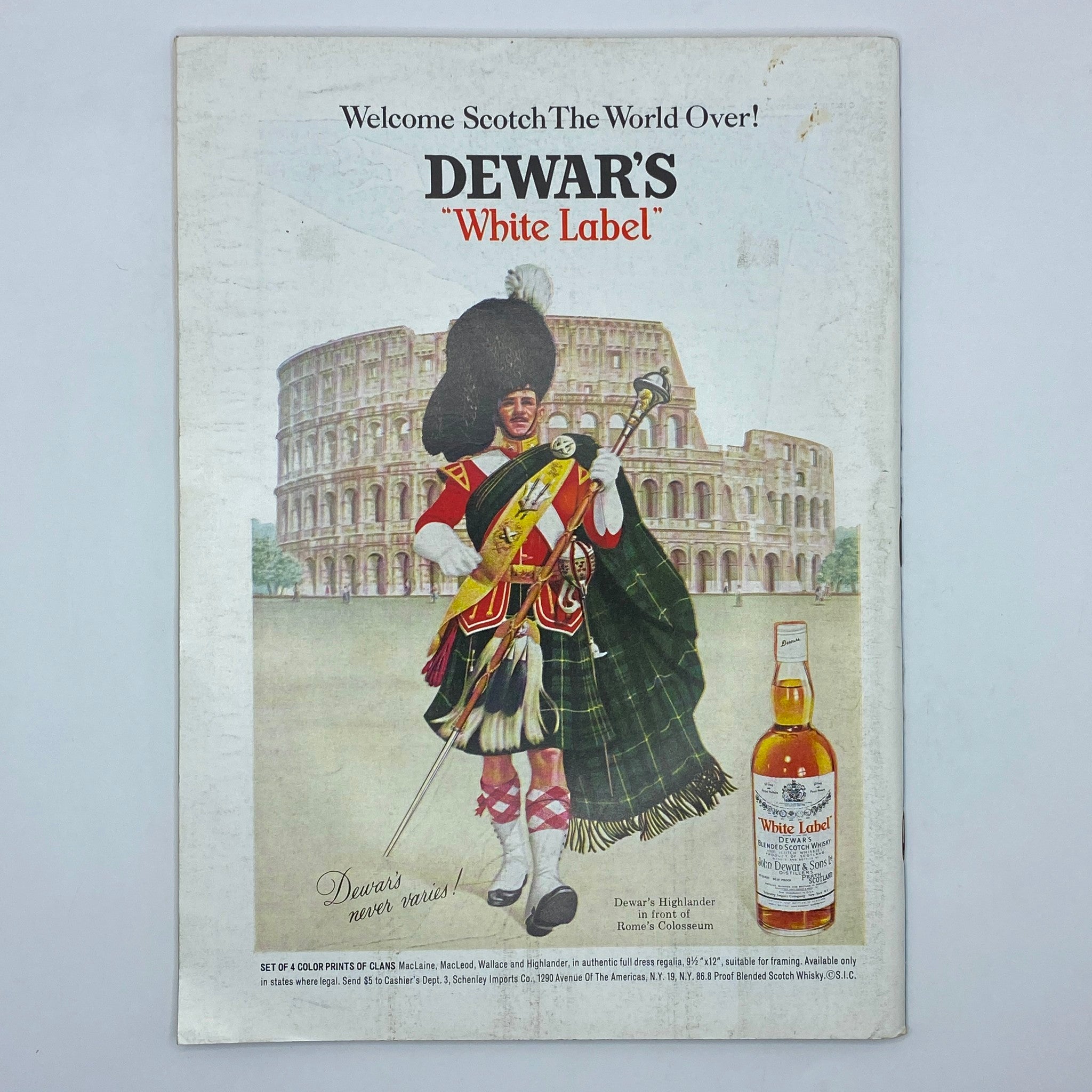 Dewar's White Label advertisement featuring a Highlander in traditional Scottish attire in front of the Roman Colosseum. The ad is part of The New Yorker Complete Magazine February 8, 1969, with a cover illustration by Chas Addams.