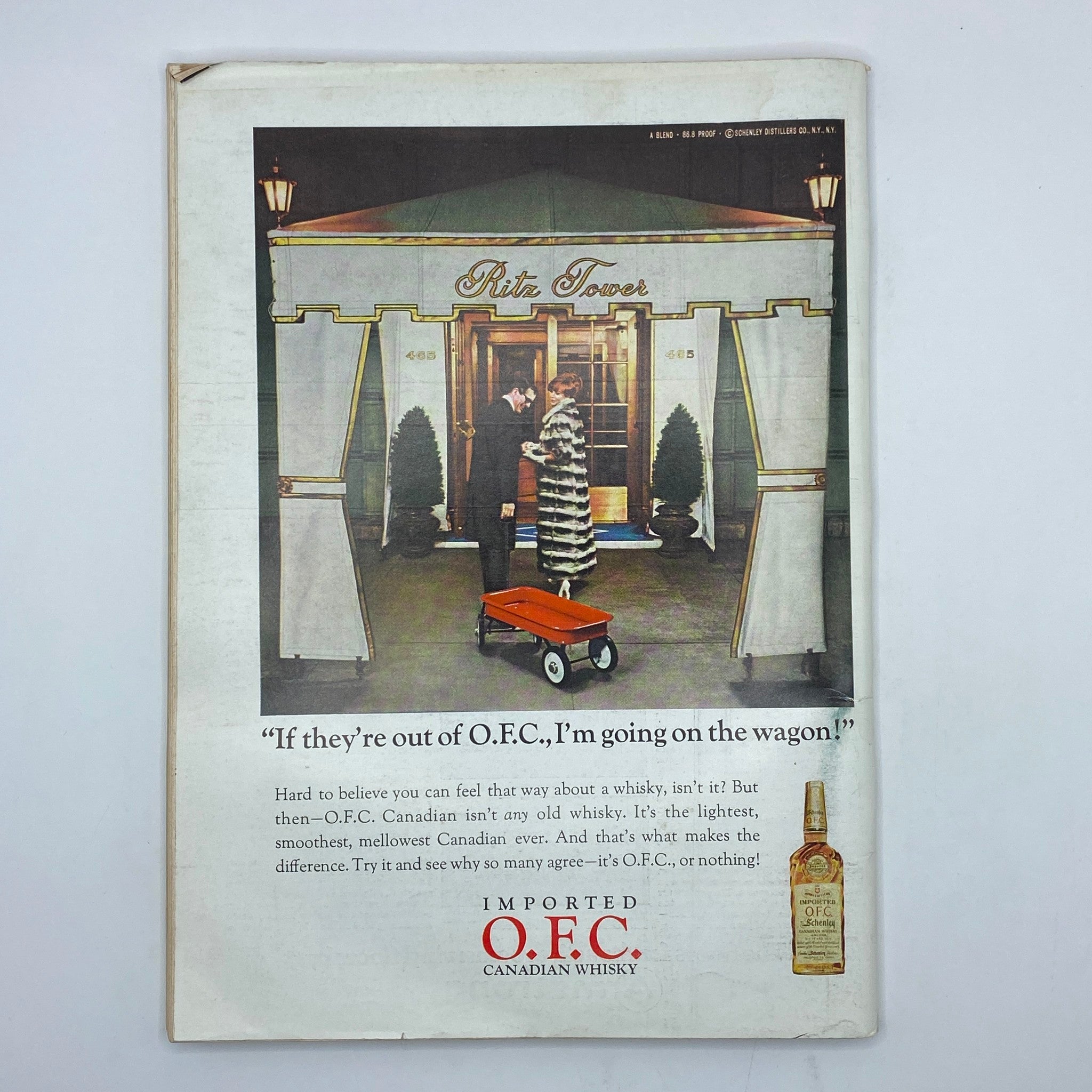 Vintage advertisement featuring a glamorous scene outside the Ritz Tower, showing a man greeting a woman in a fur coat, with the caption 'If they’re out of O.F.C., I’m going on the wagon!' showcasing O.F.C. Canadian Whisky. Related to The New Yorker Complete Magazine October 22, 1966 Charles E. Martin Cover.
