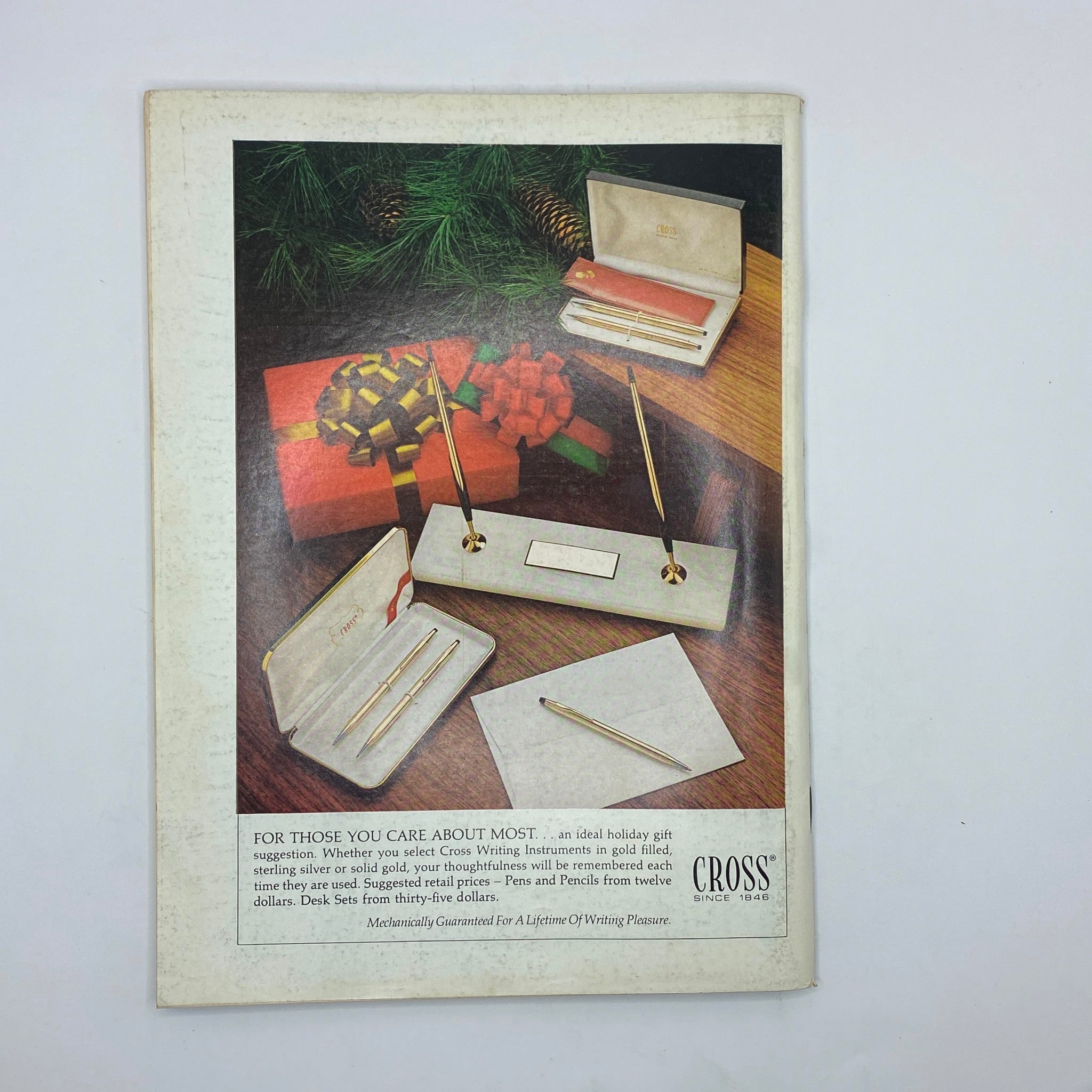 Back cover advertisement from The New Yorker Complete Magazine November 22, 1976 showcasing Cross writing instruments as holiday gifts.
