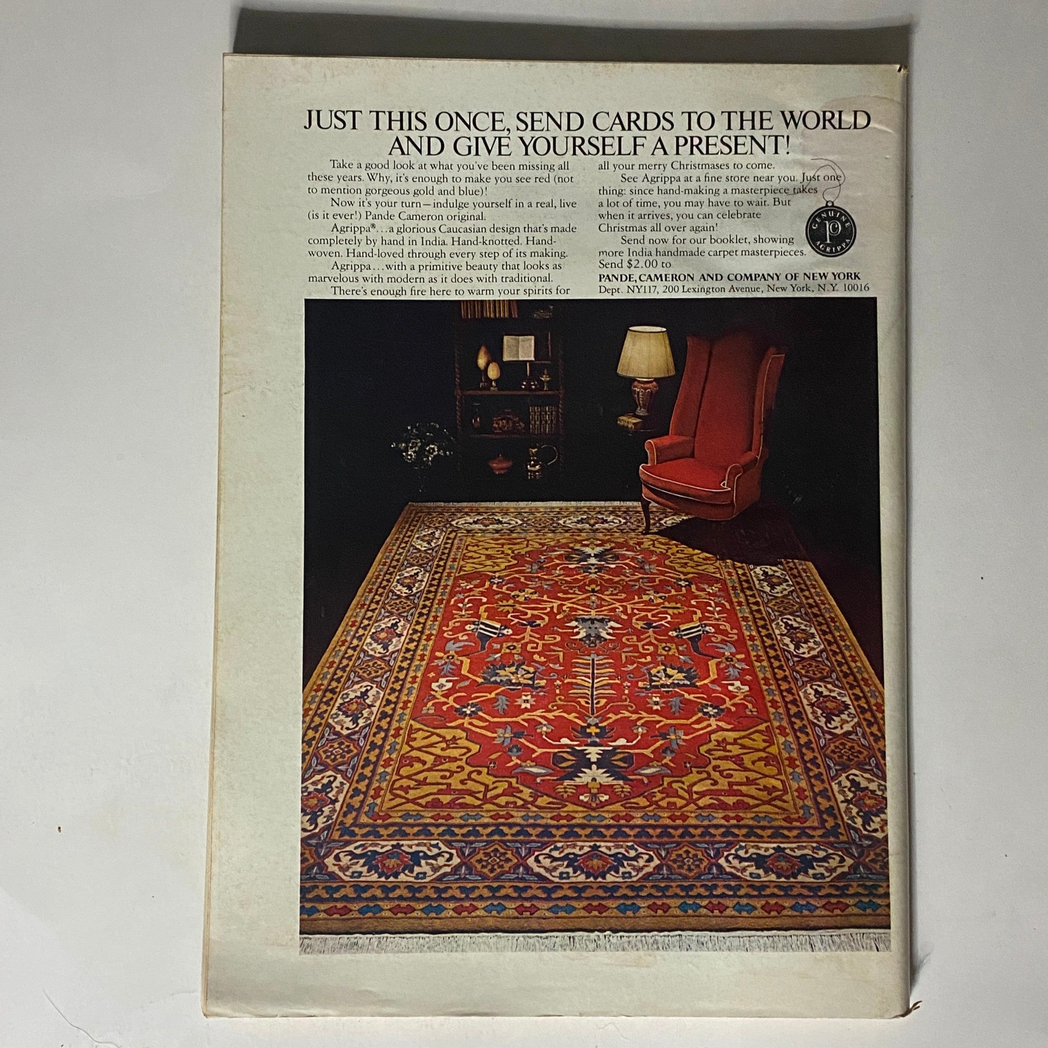 The back cover of The New Yorker Complete Magazine, November 28, 1977, featuring an advertisement for elegant carpets, showcasing a beautifully designed Persian carpet in a cozy living room setting with a red armchair and soft lighting.