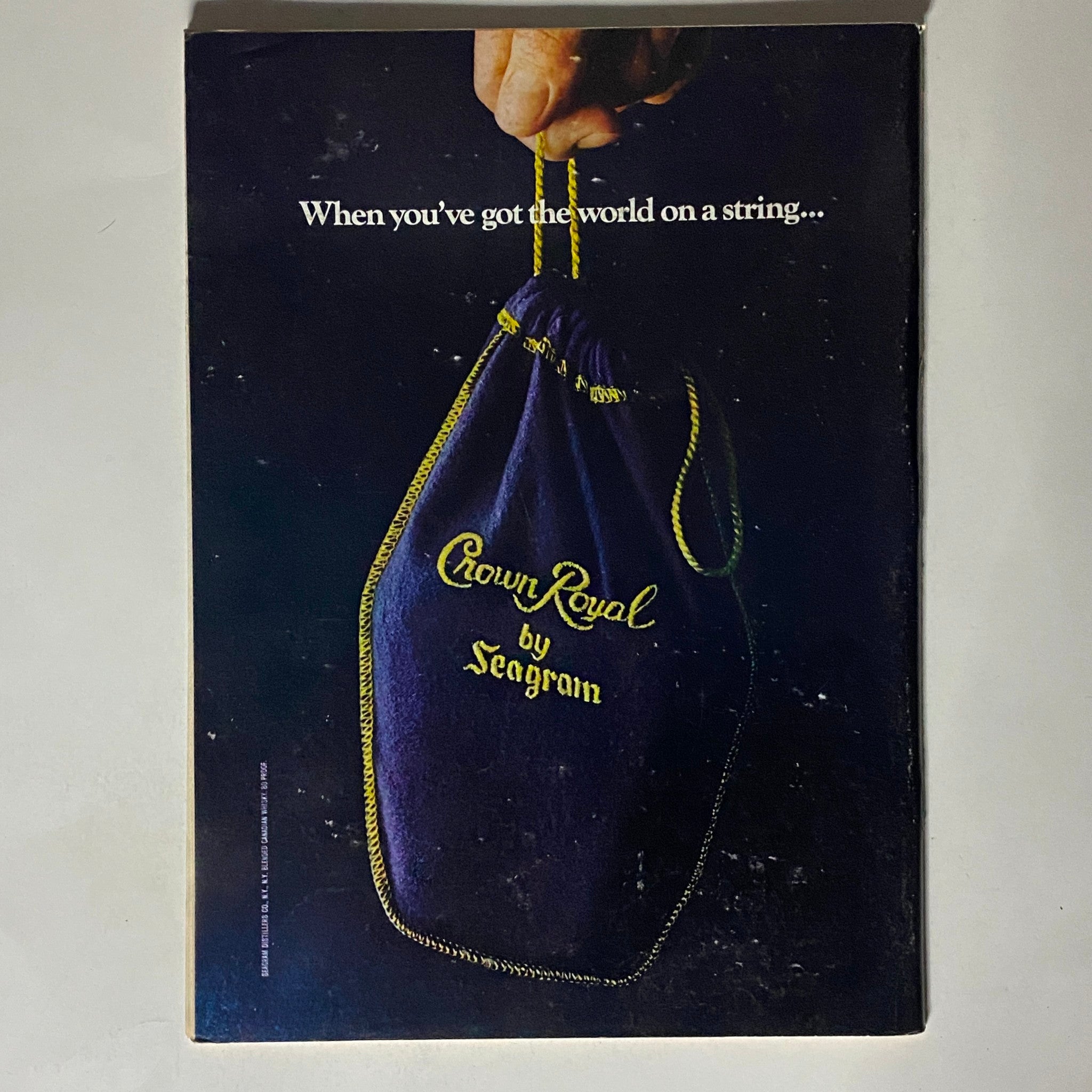 Cover of The New Yorker Complete Magazine January 23, 1978 featuring a Crown Royal ad, showcasing a purple pouch with gold lettering by Seagram, emphasizing the tagline 'When you’ve got the world on a string...'
