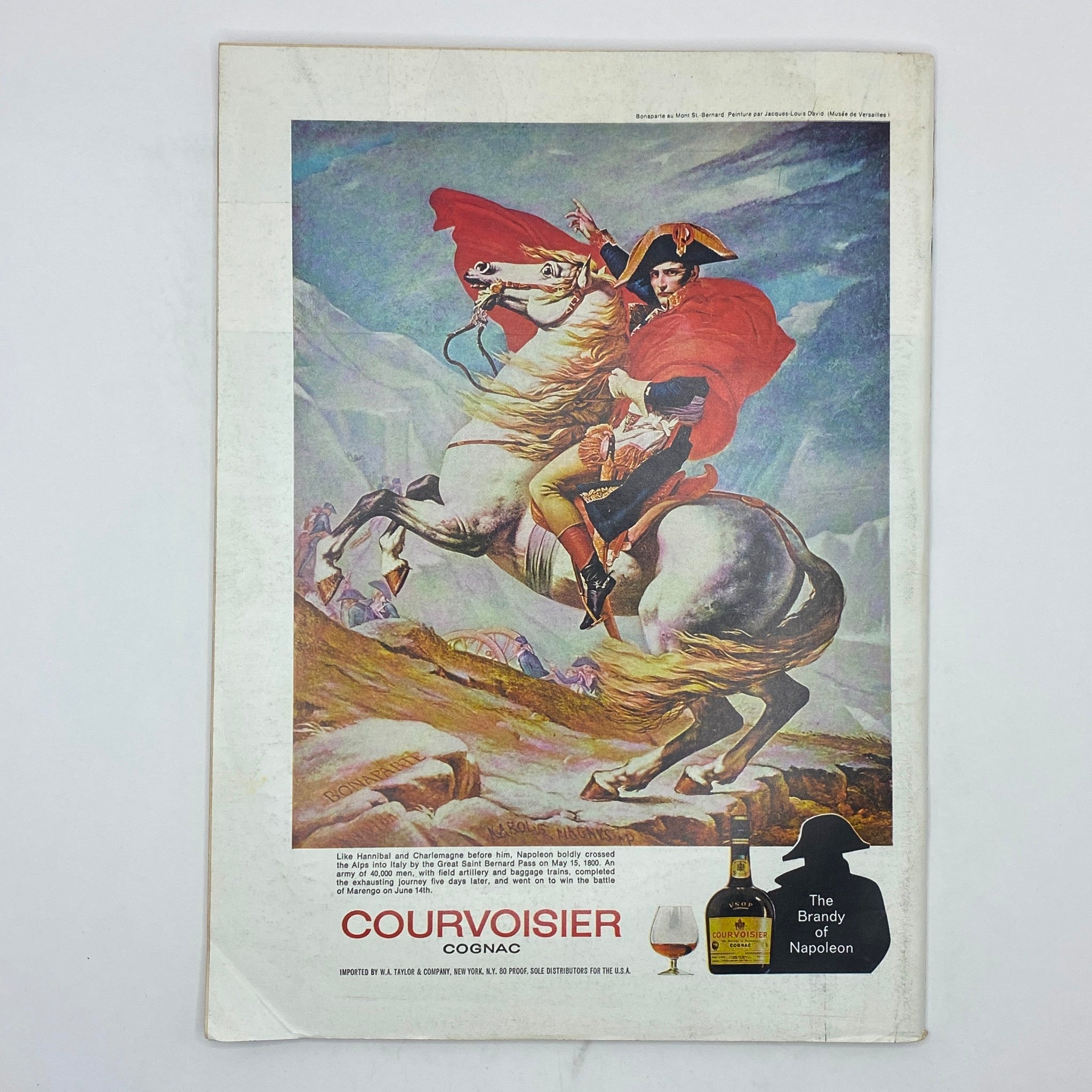 Vintage advertisement for Courvoisier Cognac, featuring a painting of Napoleon on horseback, included in The New Yorker magazine May 20, 1974.