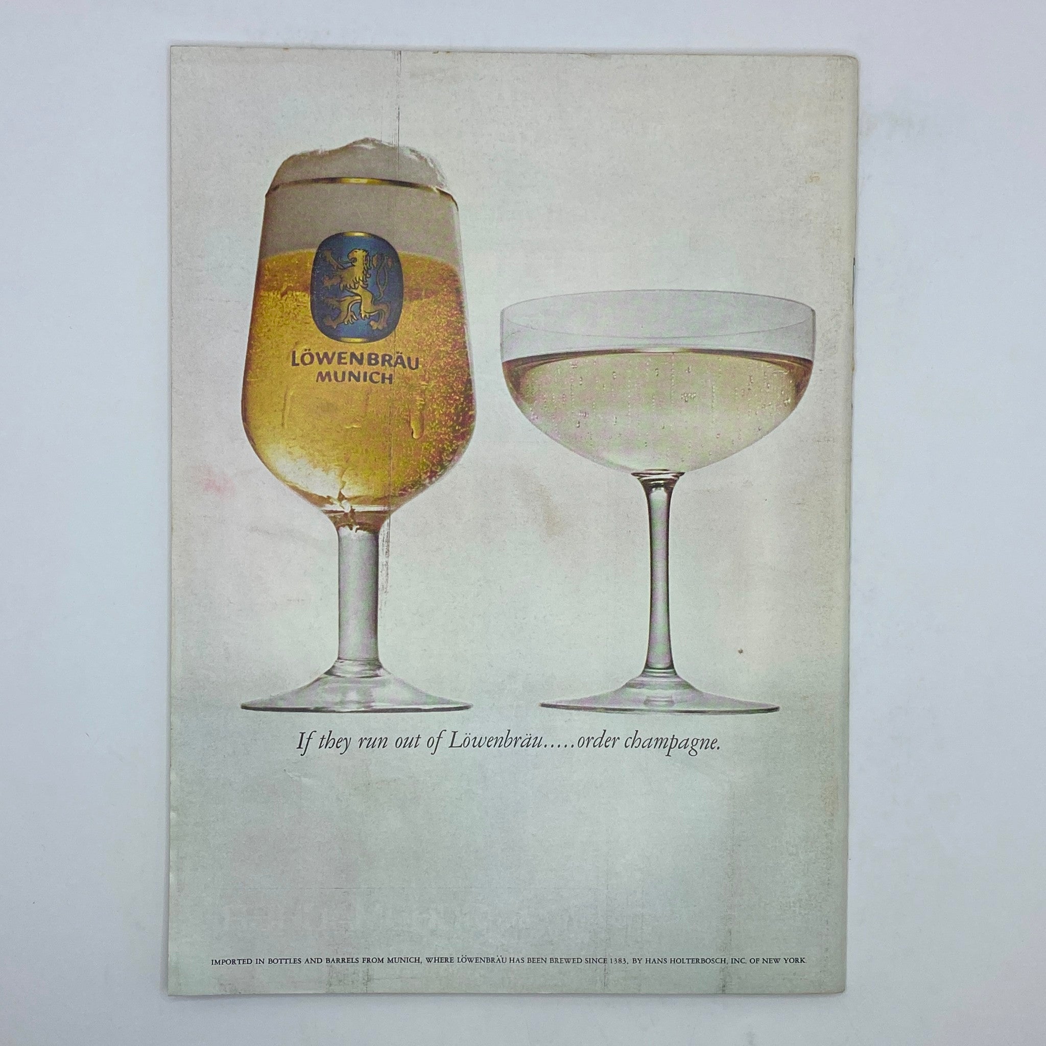 An advertisement from The New Yorker magazine dated June 24, 1974 showcasing Löwenbräu beer and champagne with the caption, 'If they run out of Löwenbräu.....order champagne.'