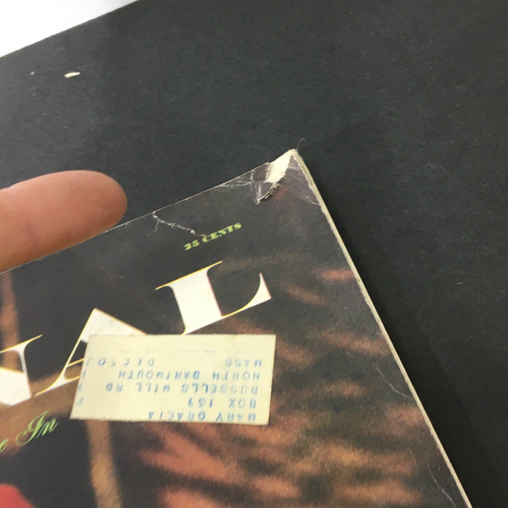 Upper corner detail of the VTG Journal Magazine March 1950 showing the price tag '25 cents' and a vintage address label on the cover, emphasizing its nostalgic value.