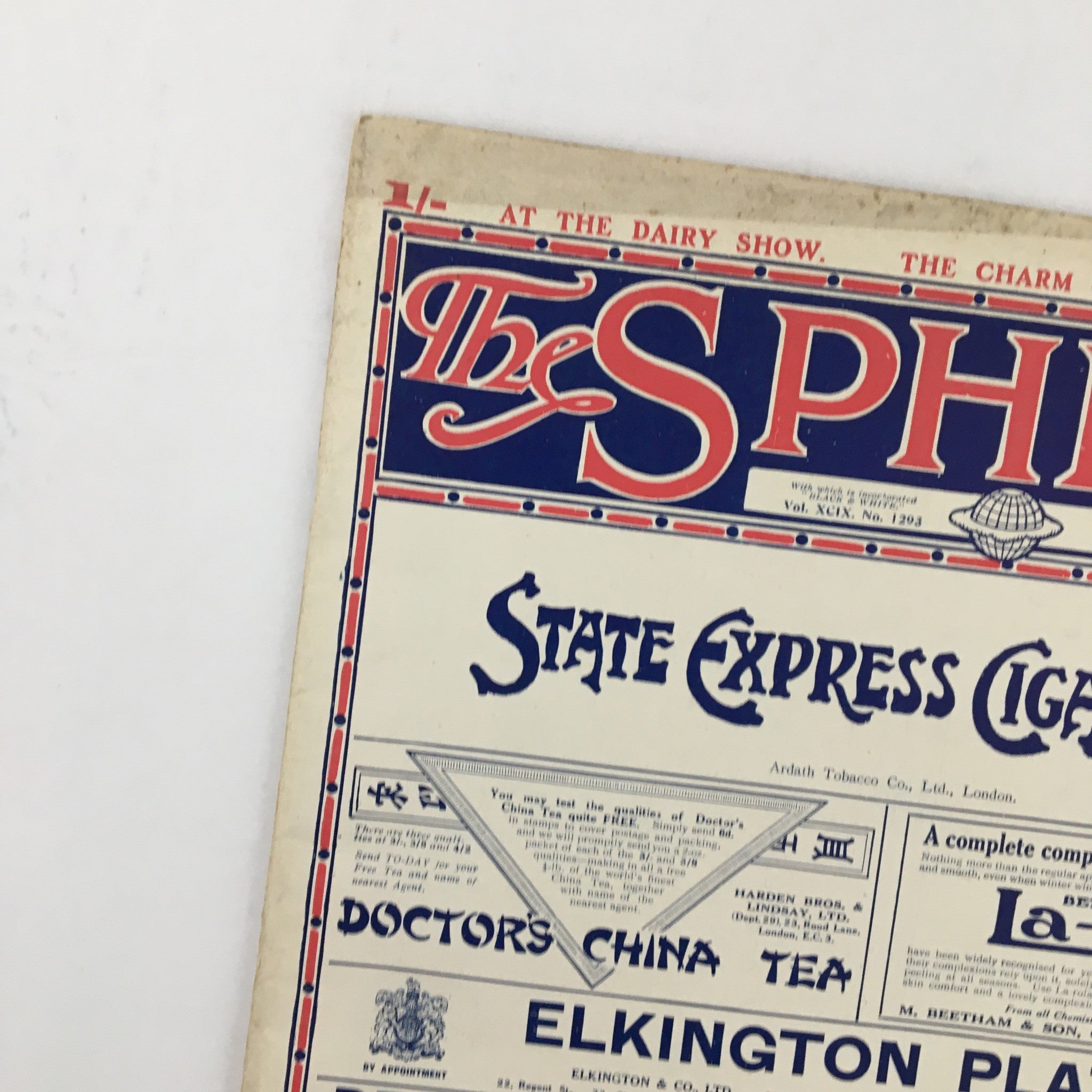 Close-up of The Sphere Newspaper, November 1, 1924, highlighting the advertisement for State Express Cigarettes and other products.