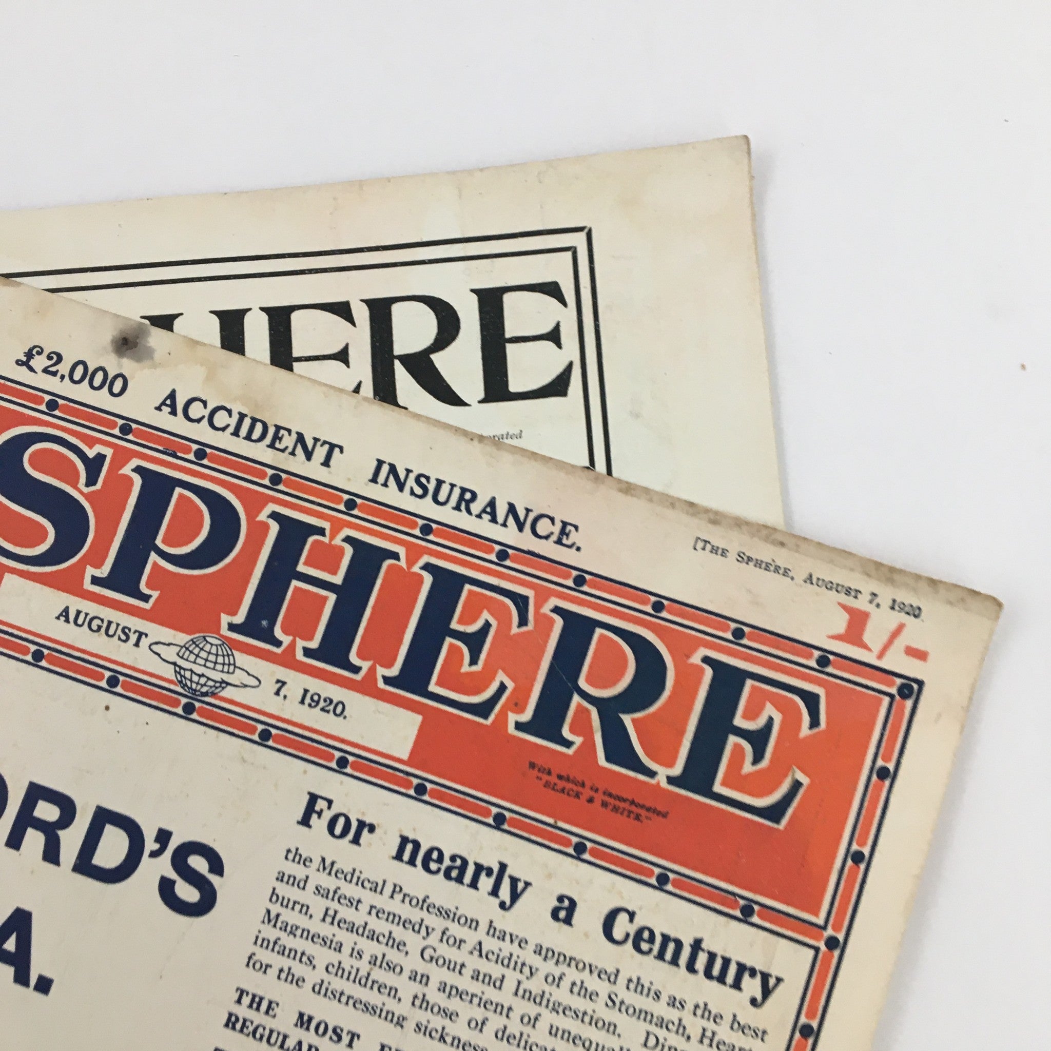 Detailed shot of The Sphere Newspaper August 7 1920 with visible wear and the title prominently displayed, capturing the vintage appeal.