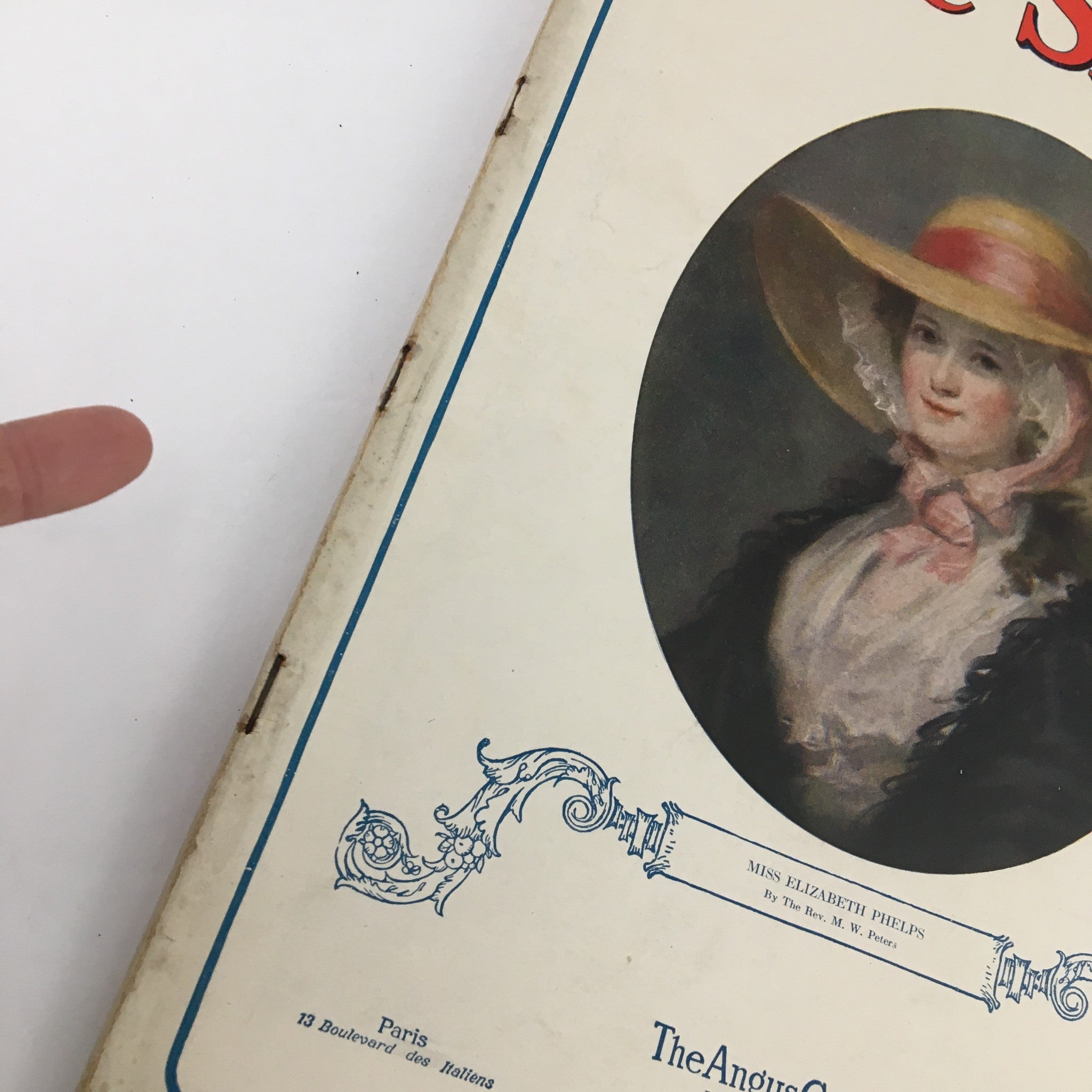 Close-up of the cover of The Spur Magazine, January 1, 1926, highlighting details of the artwork of a woman titled 'Miss Elizabeth Phelan'.