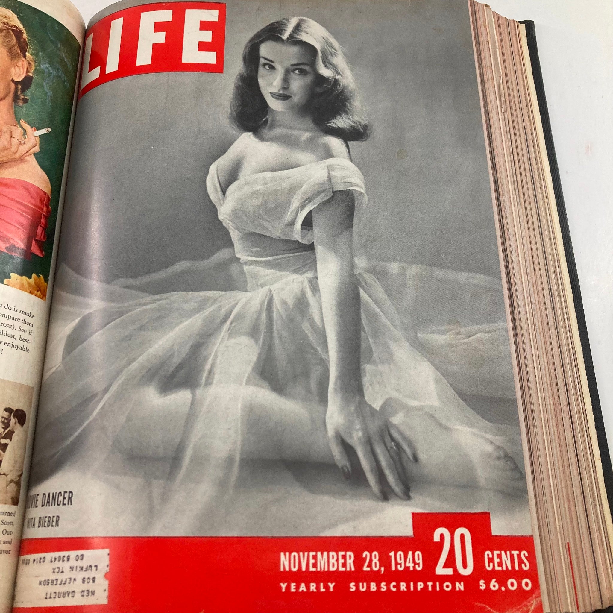 Cover of VTG 1949 Bound Life Magazine showcasing a model in a flowing dress, from the November 28, 1949 issue, highlighting beauty and fashion.