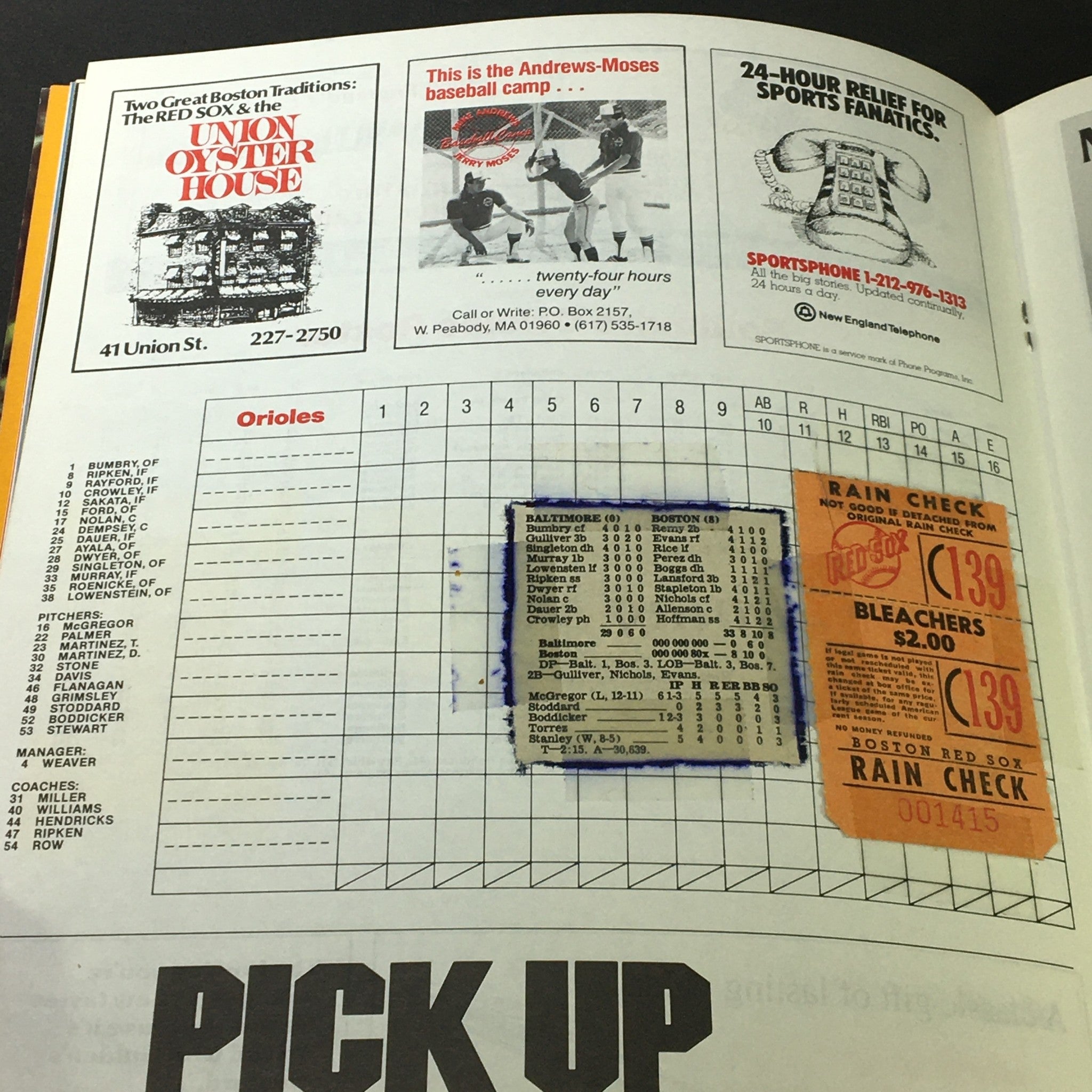 Interior page of the Boston Red Sox 1982 Scorebook with scorekeeping details and advertisements, exemplifying its historical significance.