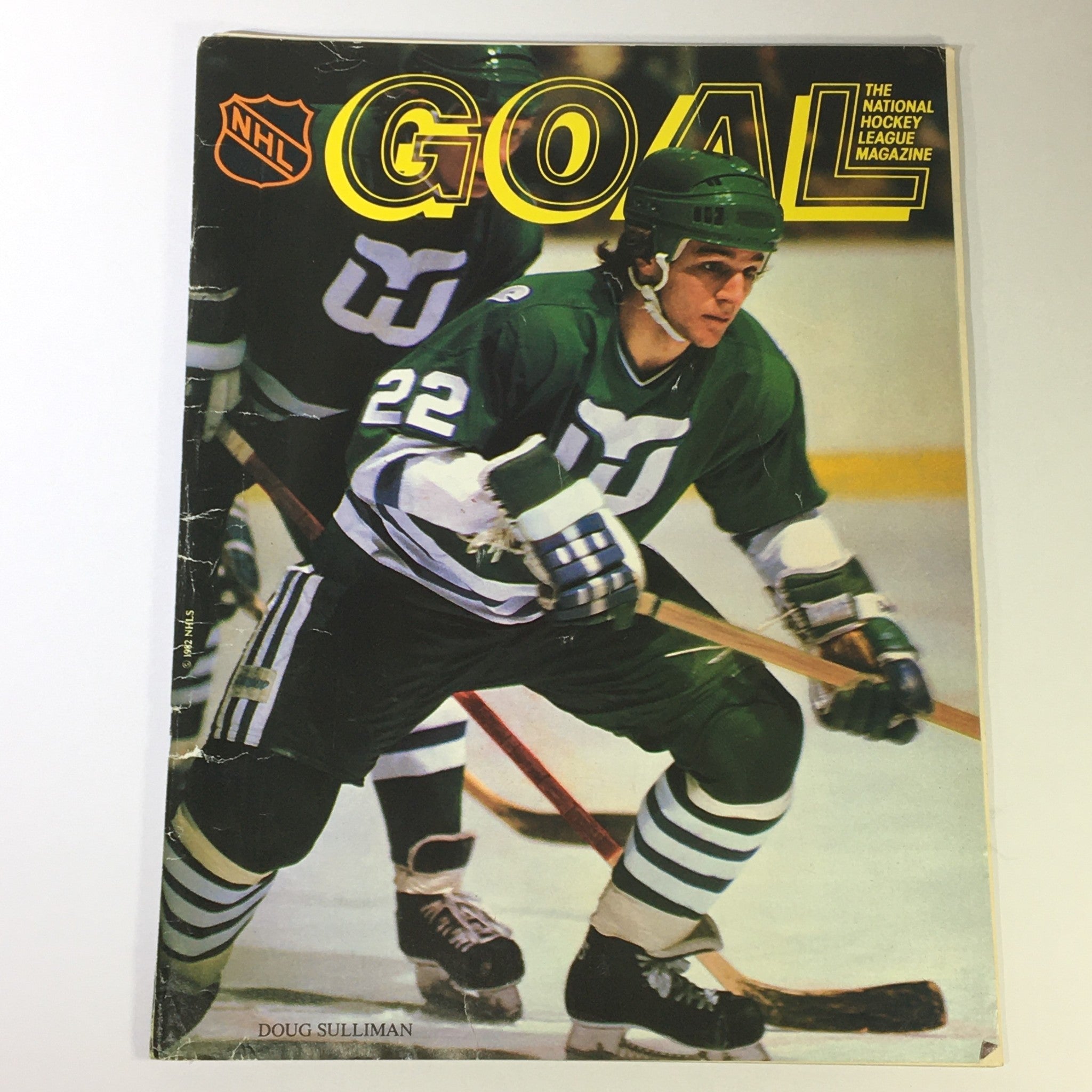 Cover of the VTG Goal NHL Magazine January 1983 Vol 11 #30 featuring Doug Sulliman in action on the ice, showcasing vintage hockey memorabilia.