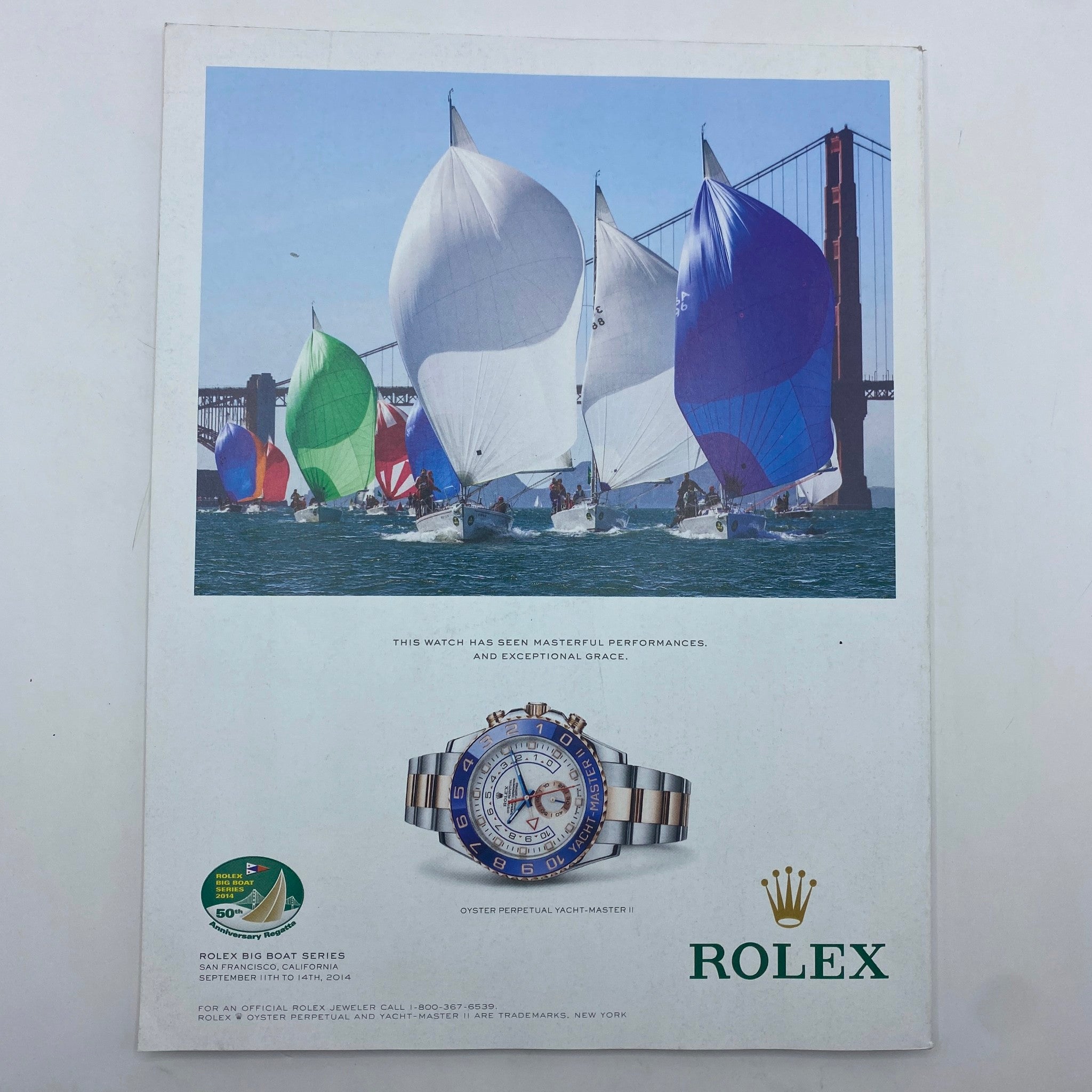 Fortune Magazine September 1, 2014 advertisement for Rolex showcasing sailboats with bold, colorful sails, emphasizing luxury and performance in luxury timepieces.