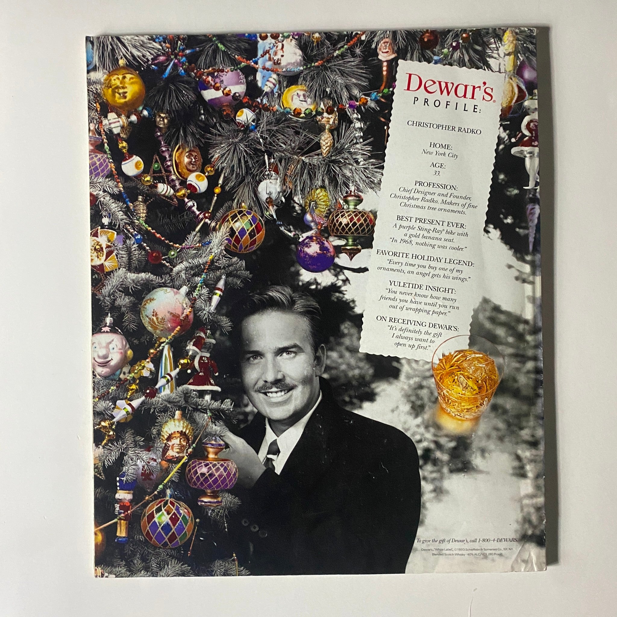 Advertisement page from the Fortune Magazine December 27, 1993 issue, showcasing Dewar's profile and festive decorations. The image includes a man beside a decorated Christmas tree.