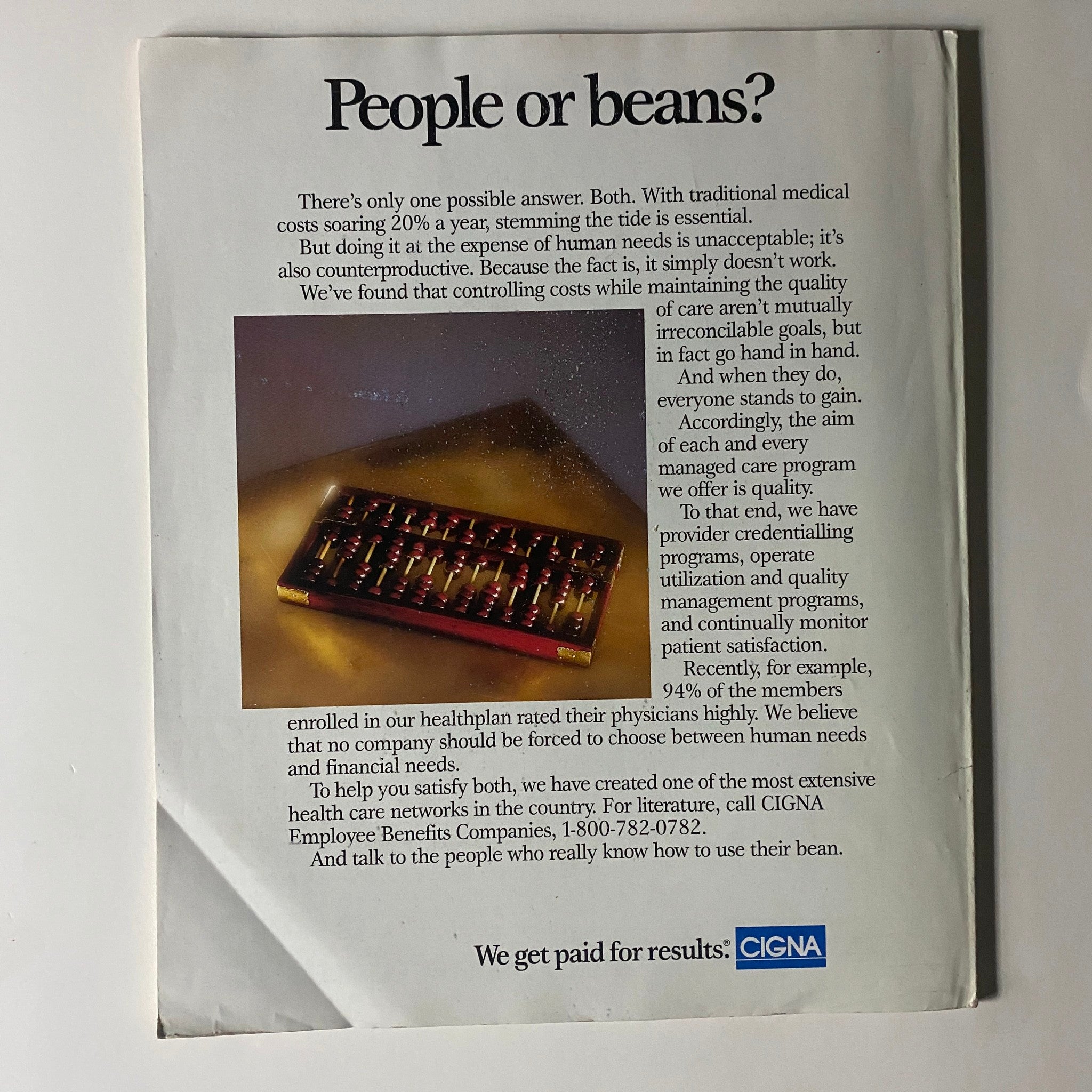 Back cover of Fortune Magazine, February 24, 1992, featuring a thought-provoking advertisement titled 'People or beans?' discussing the balance between controlling healthcare costs and maintaining quality of care.
