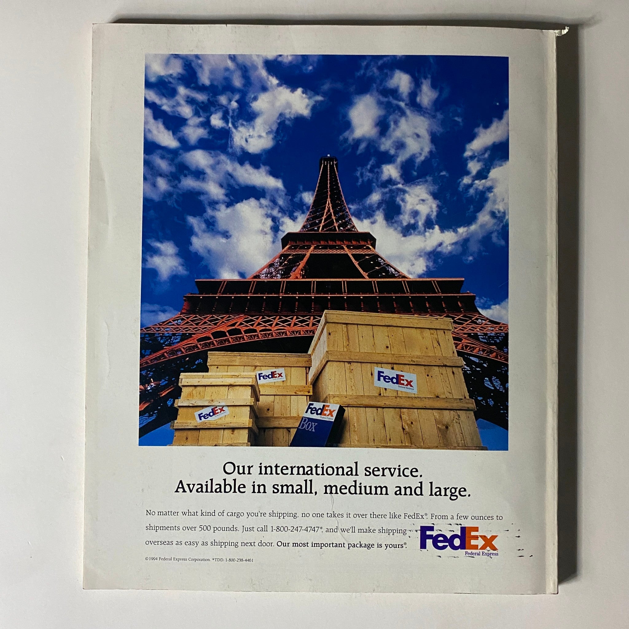Cover image of Fortune Magazine, October 31, 1994, featuring the title 'The Coming Investor Revolt', with a focus on an advertisement featuring the Eiffel Tower and FedEx shipping service.