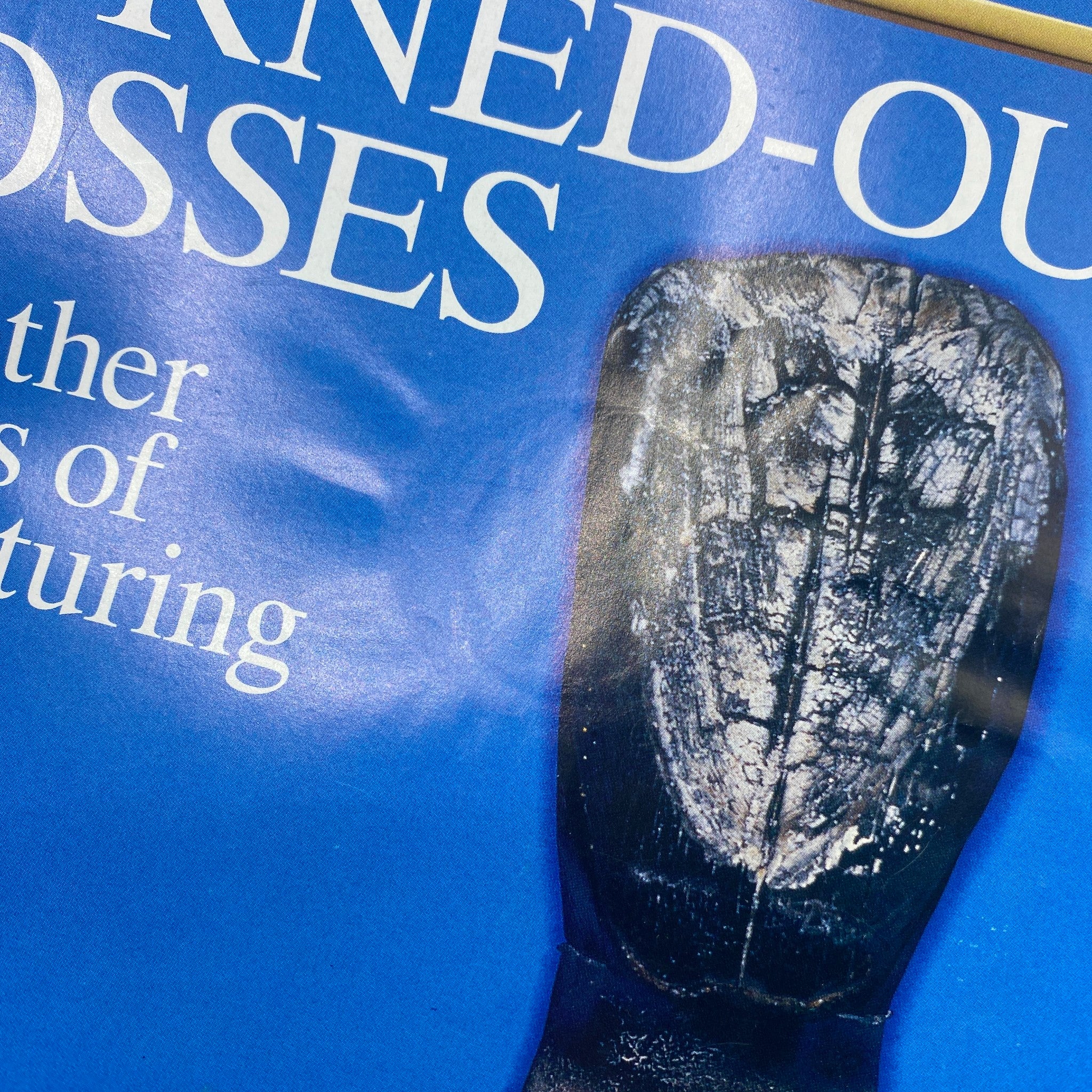 Close-up of the cover of Fortune Magazine dated July 25, 1994, highlighting the phrase 'Burned-Out Bosses' against a blue background with a unique graphic representation.
