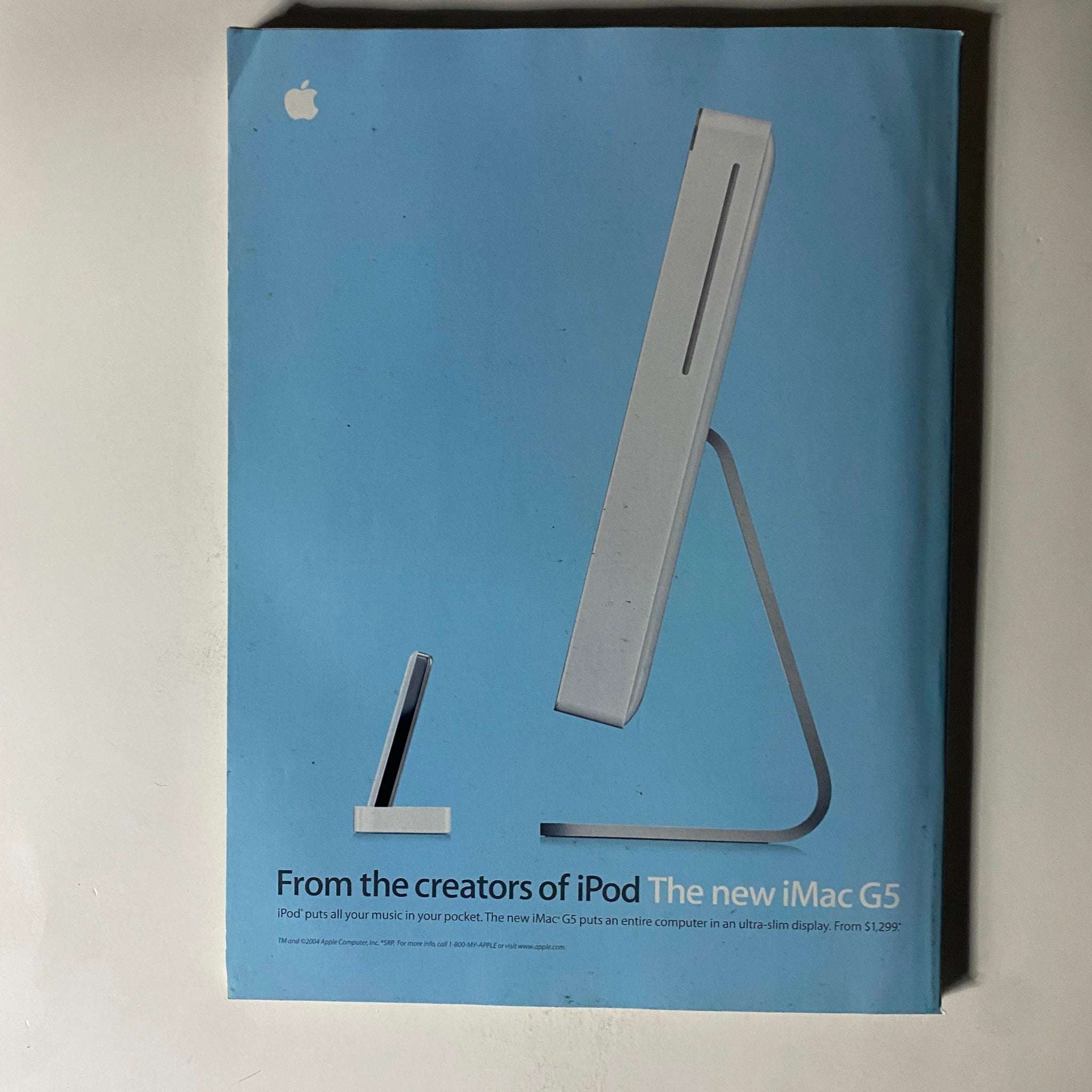 Cover of the new iMac G5 advertisement highlighting its sleek design and features, from the creators of iPod.