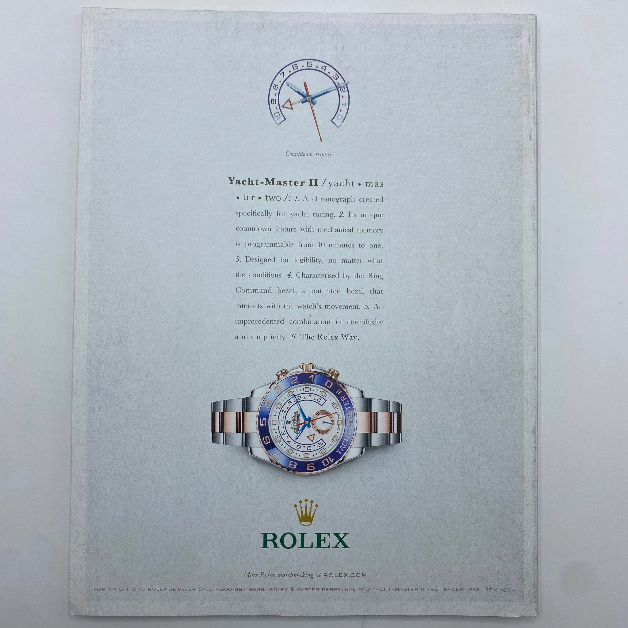Fortune Magazine December 1, 2014 includes an advertisement for Rolex Yacht-Master II watch, highlighting its features and association with luxury and precision.