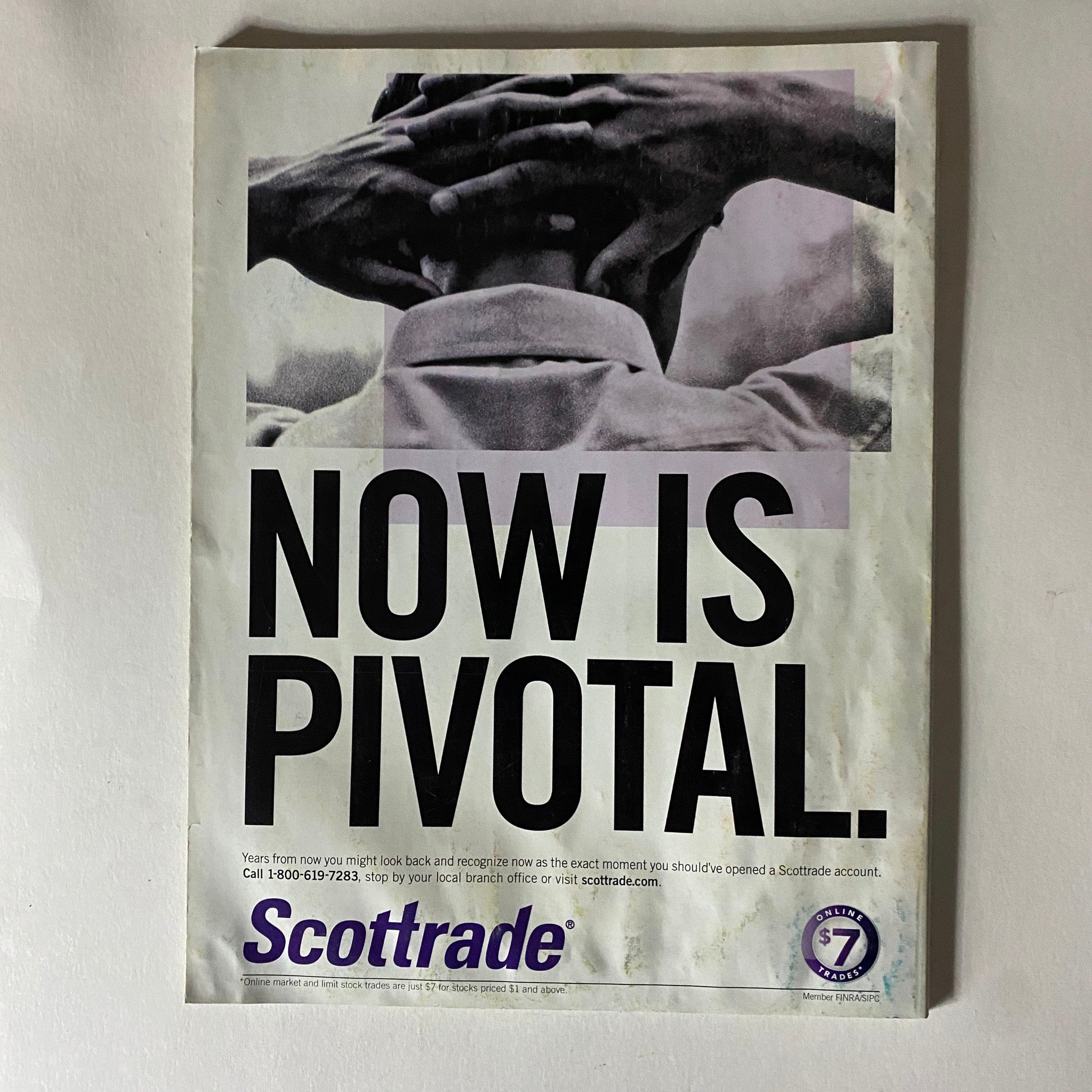Advertisement in Fortune Magazine December 21, 2009 with the message 'Now Is Pivotal' for Scottrade, emphasizing the importance of timely financial decisions.