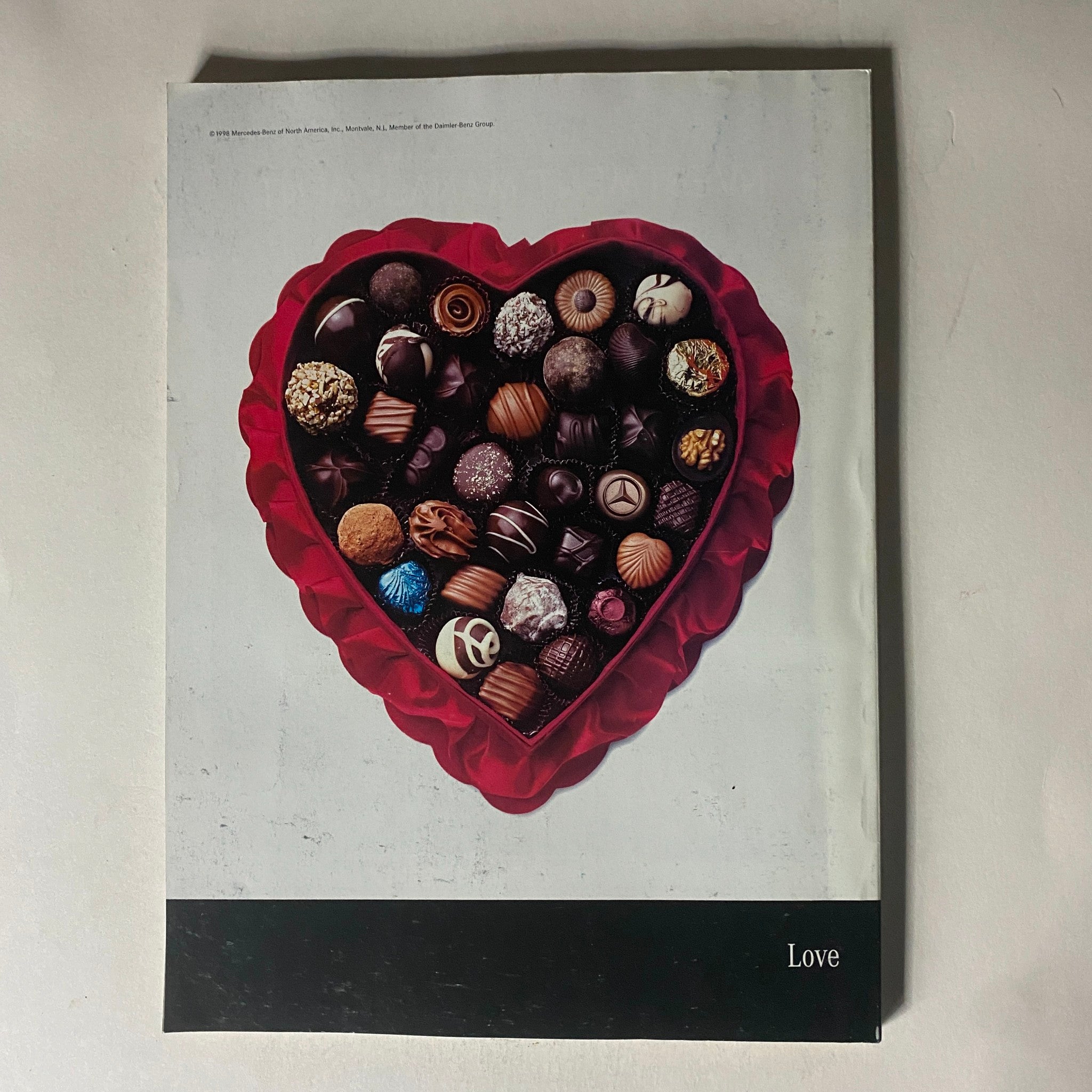 Fortune Magazine February 16, 1998 cover featuring a heart-shaped box of assorted chocolates, symbolizing love, with a focus on the article 'Cable Cowboy John Malone Rides Again'.
