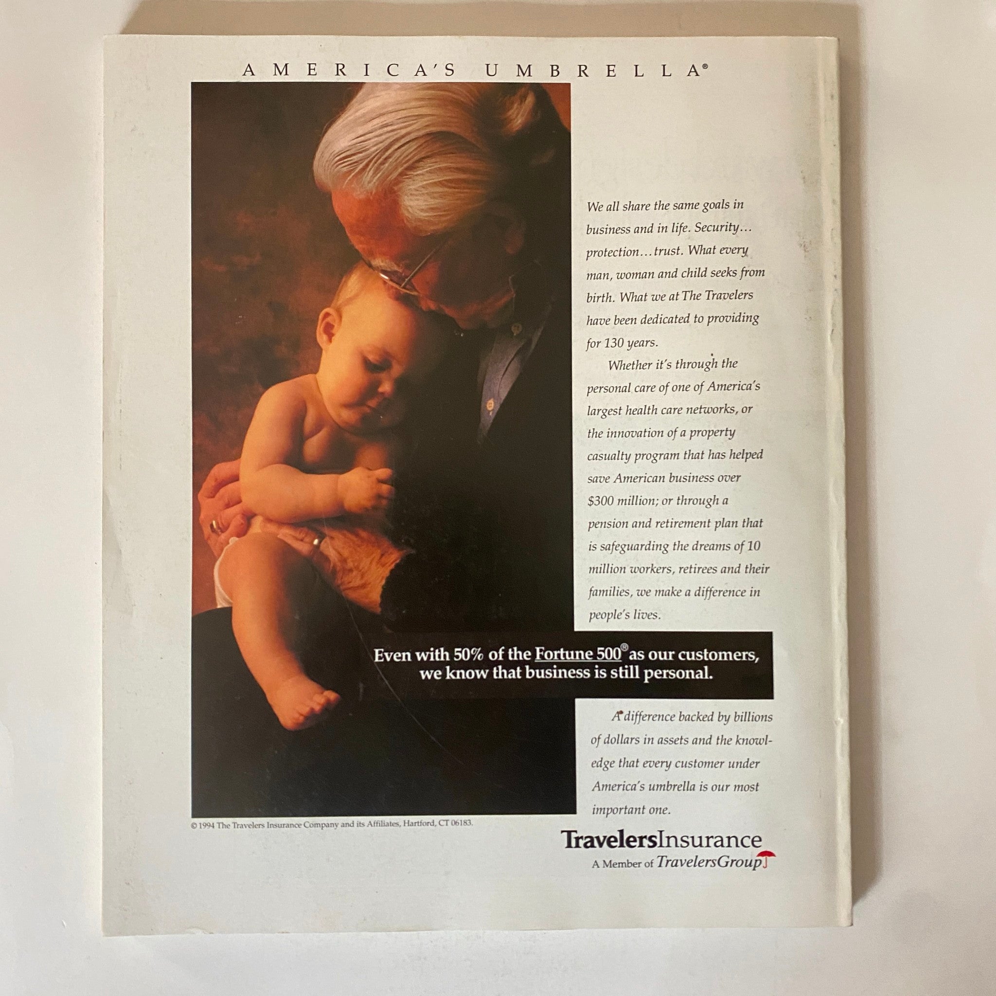 Back cover of Fortune Magazine from December 12, 1994, featuring an advertisement for Travelers Insurance, emphasizing personal connections in business.