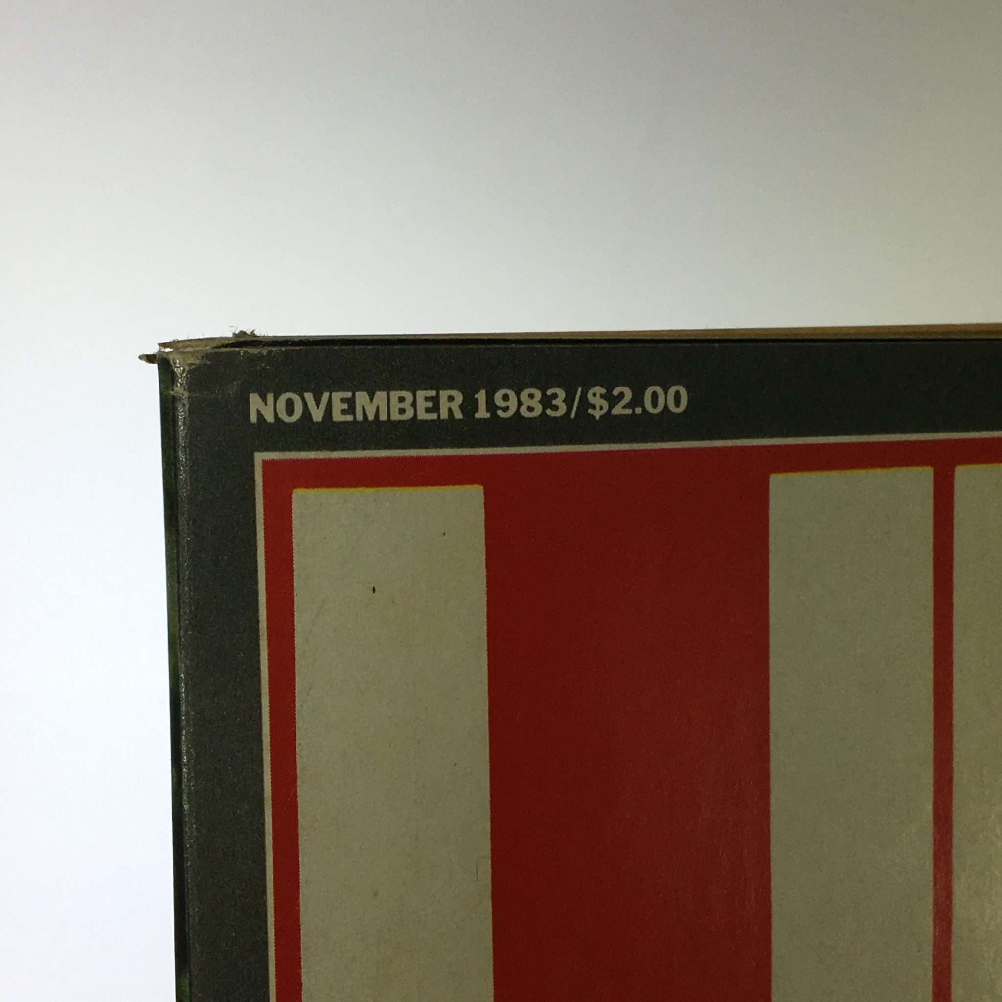 Spine view of VTG Life Magazine November 1983, highlighting the date and price of $2.00, featuring John F. Kennedy on the cover. This vintage magazine is a collectible item for history enthusiasts.