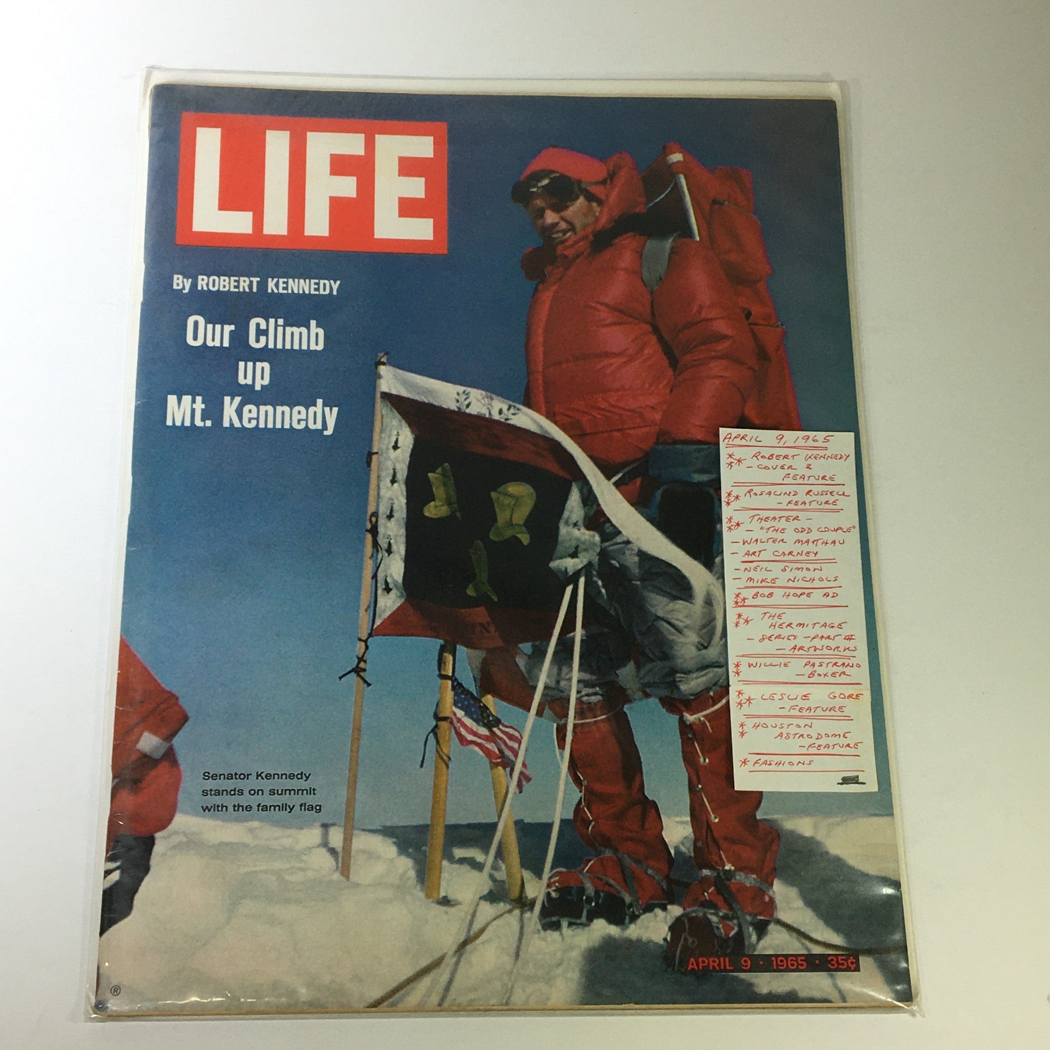 VTG Life Magazine cover from April 9, 1965 featuring Robert Kennedy's Climb up Mt. Kennedy, featuring annotations and showcasing Senator Kennedy in red winter attire on a snowy peak.