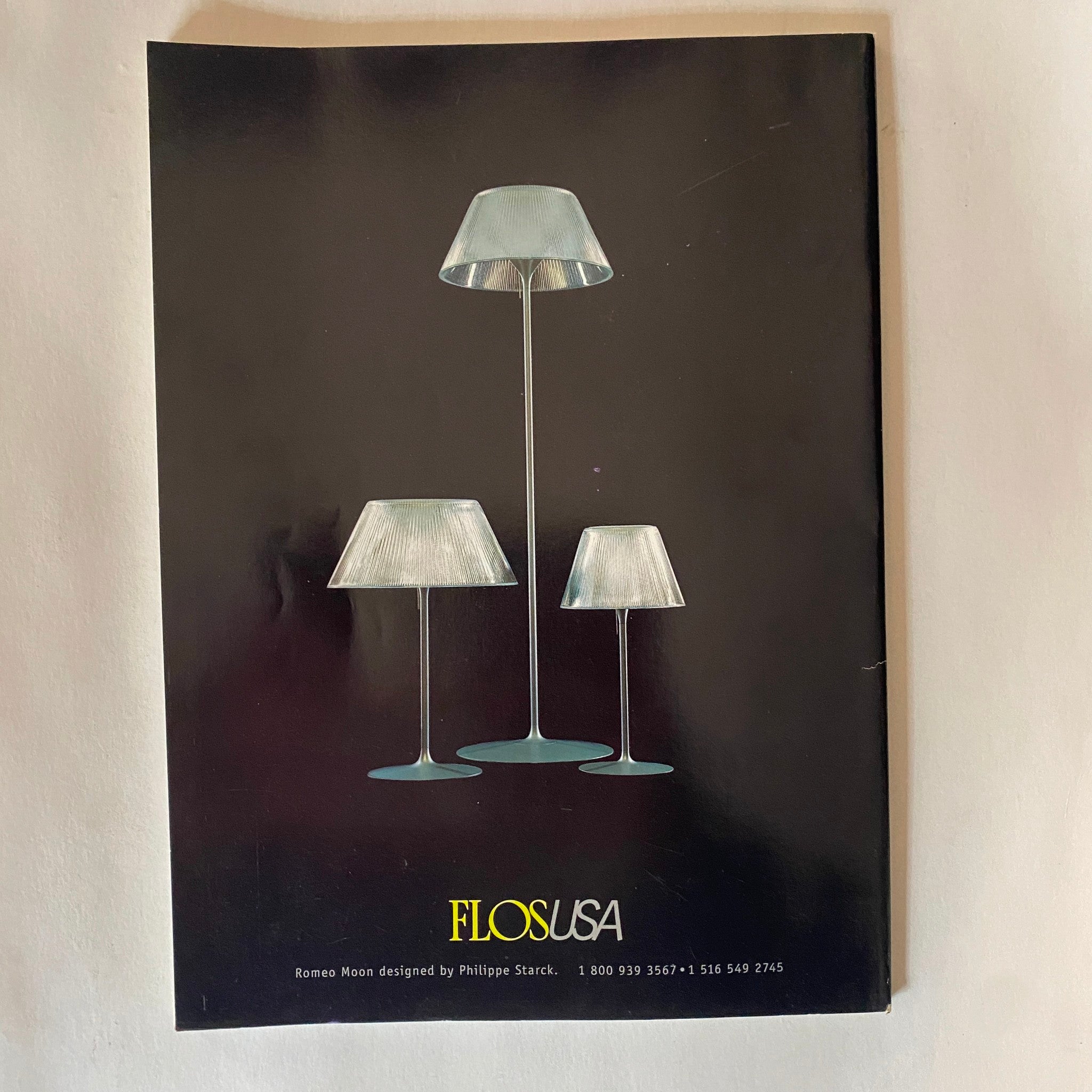Cover of Italia Magazine August 1999 featuring a tribute to Joe DiMaggio, showcasing a sleek design with images of contemporary lamps by Flos USA.