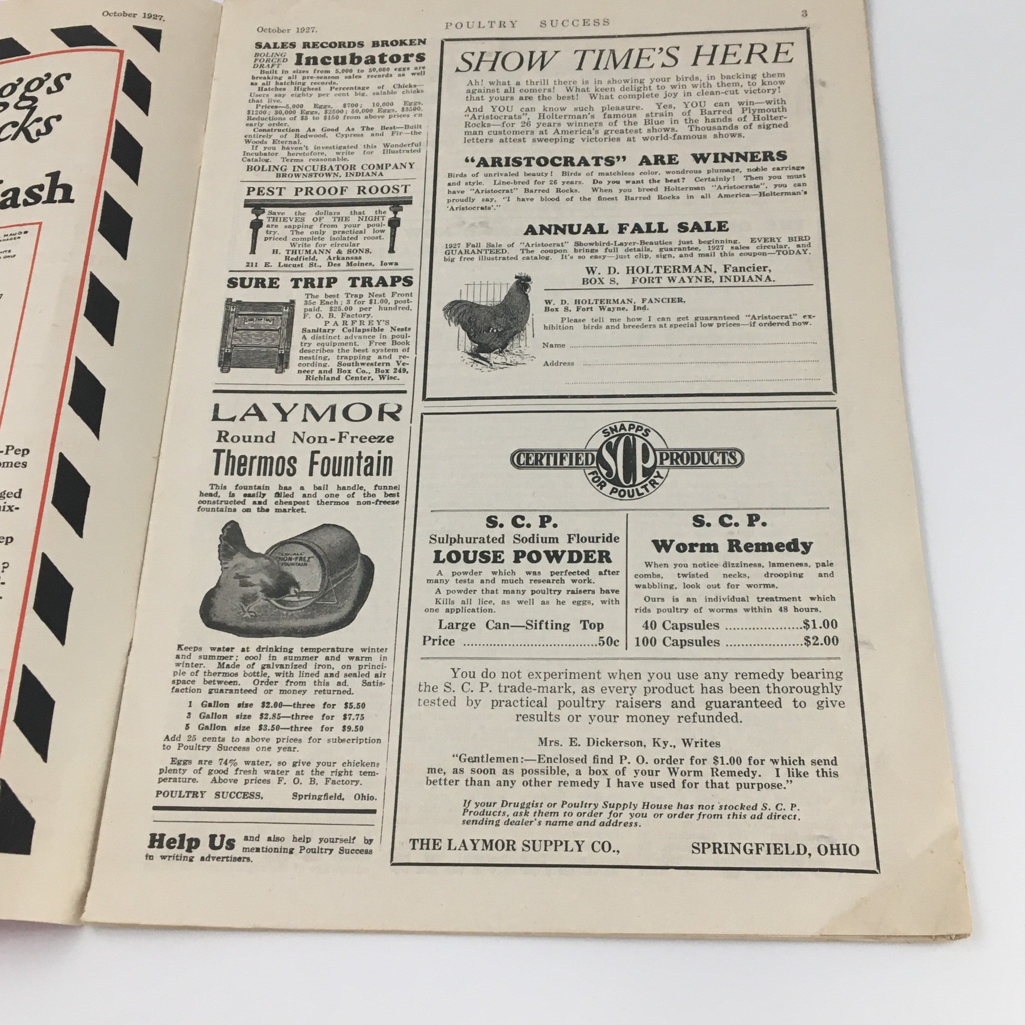 Interior page of VTG Poultry Success Magazine October 1927 featuring advertisements for poultry equipment and products, highlighting agricultural practices of the era.