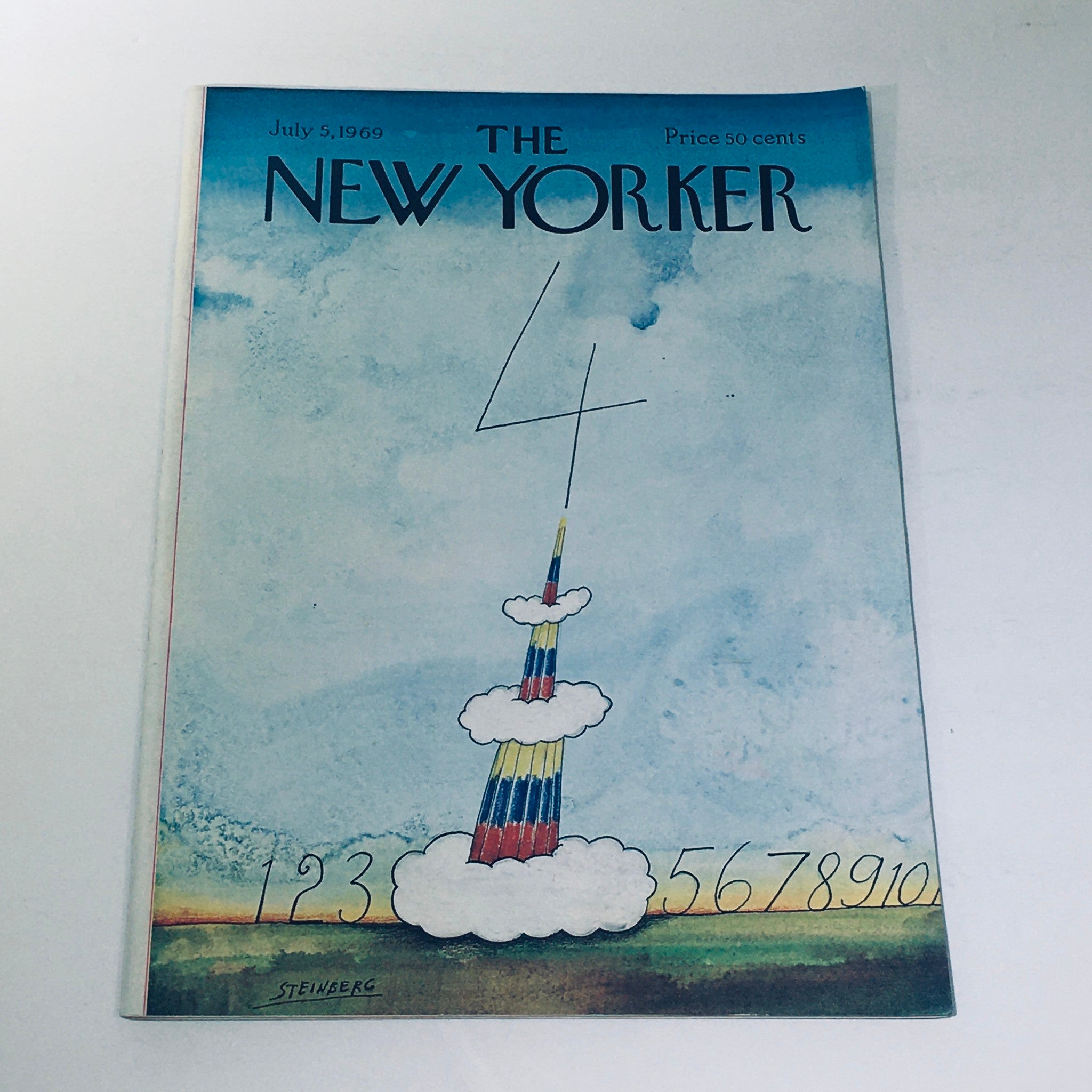Cover of The New Yorker dated July 5, 1969, featuring a whimsical illustration by Saul Steinberg depicting a colorful tower amidst clouds, with the number 4 prominently displayed. This vintage magazine captures the spirit of Independence Day.