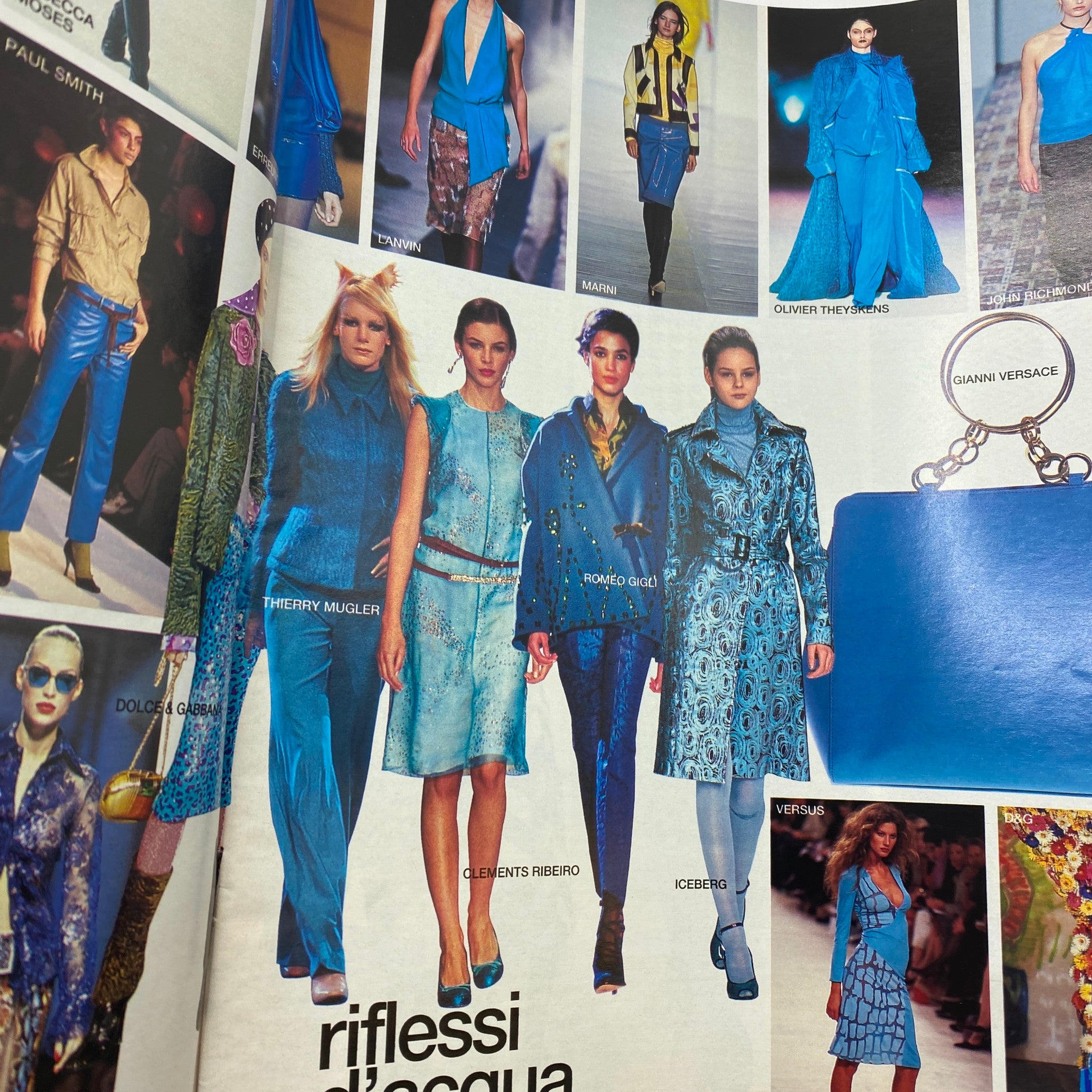 Interior page from Marie Claire French Supplement August 2000 showcasing models in blue outfits, highlighting designer styles from Thierry Mugler and others.