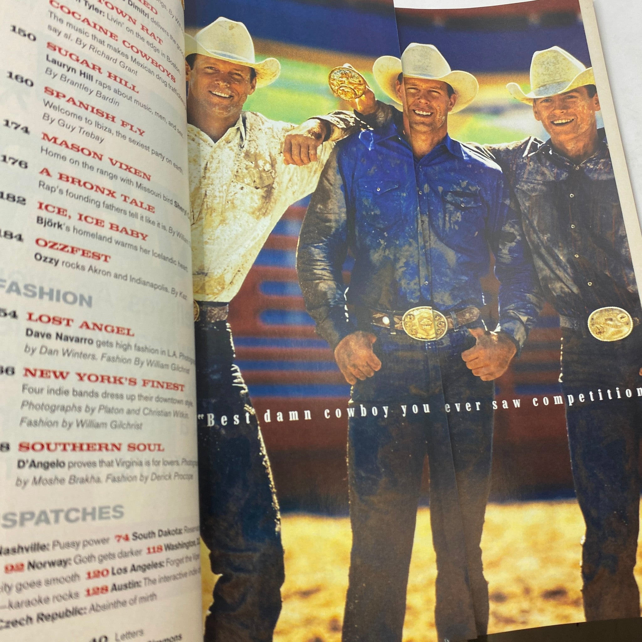 Inside spread of Details Magazine November 1998 showcasing three cowboys, celebrating western culture and fashion, indicating the diverse topics covered in this issue.
