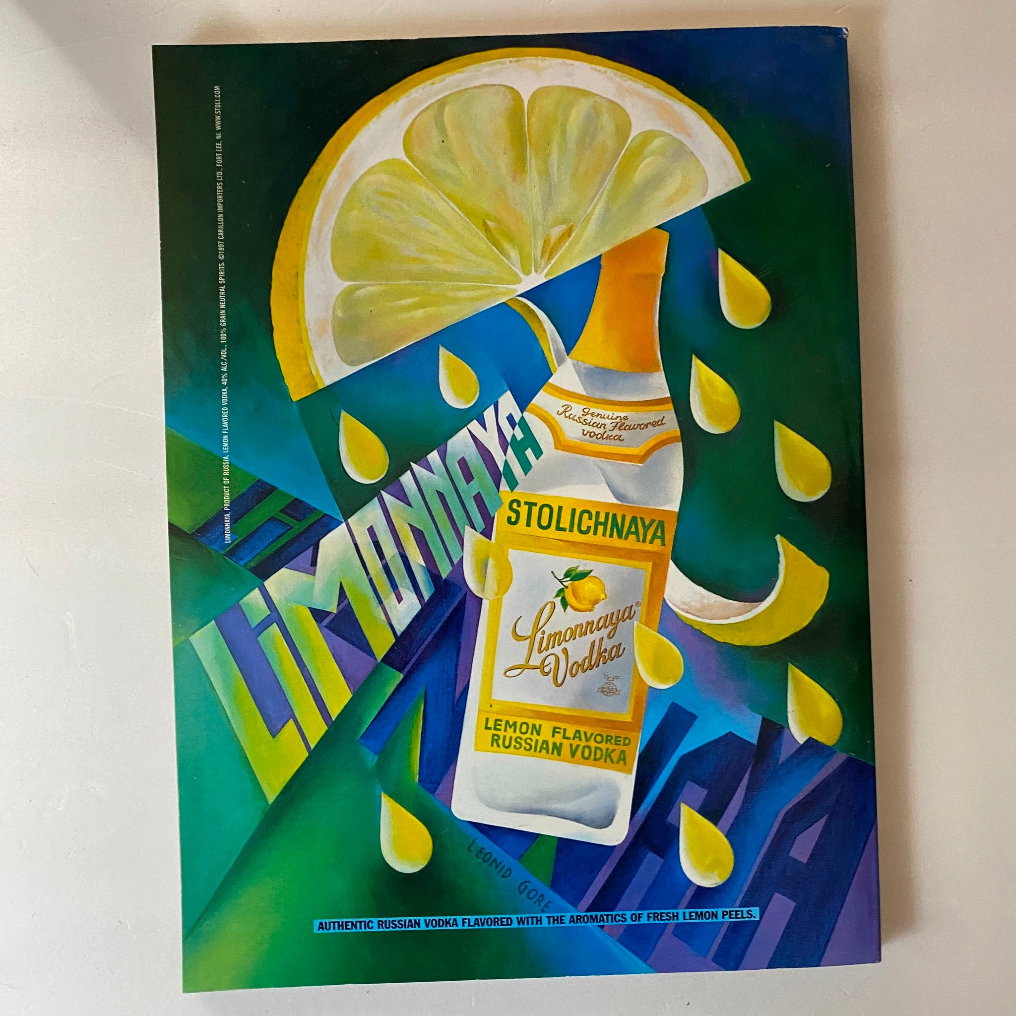 Artistic advertisement for Stolichnaya Limonaya Vodka from Details Magazine November 1998, showcasing a vibrant design of fresh lemons and vodka with bright colors, emphasizing the beverage's flavor profile.