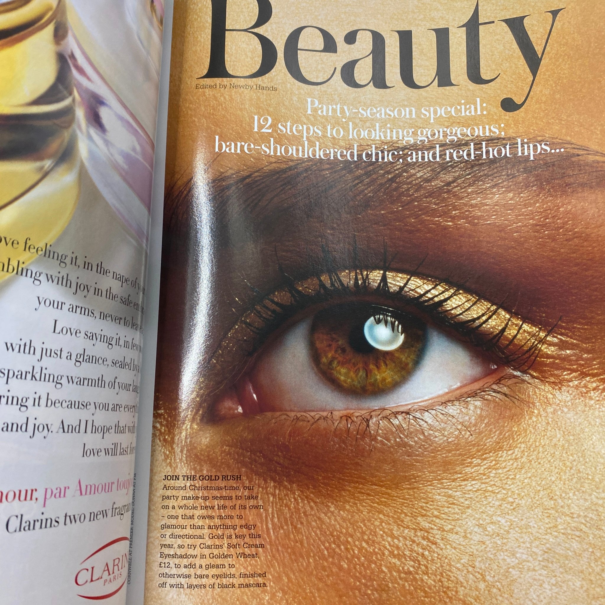 Close-up of a beauty editorial in Harpers & Queen UK Magazine December 2005, featuring an artistic eye makeup look with golden accents.