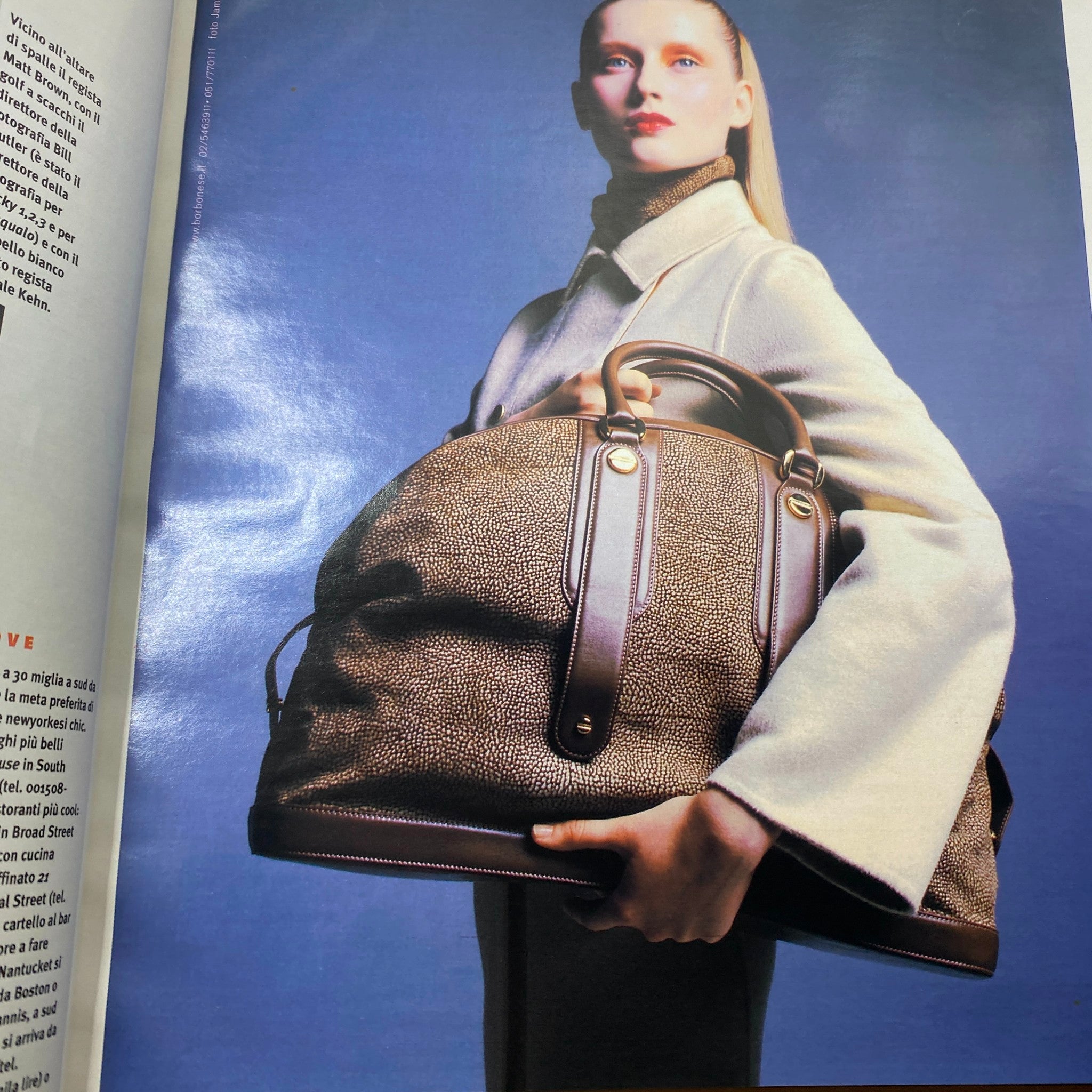 Model holding a large handbag in a fashion editorial from Marie Claire French Magazine August 2000, emphasizing stylish accessories of the season.
