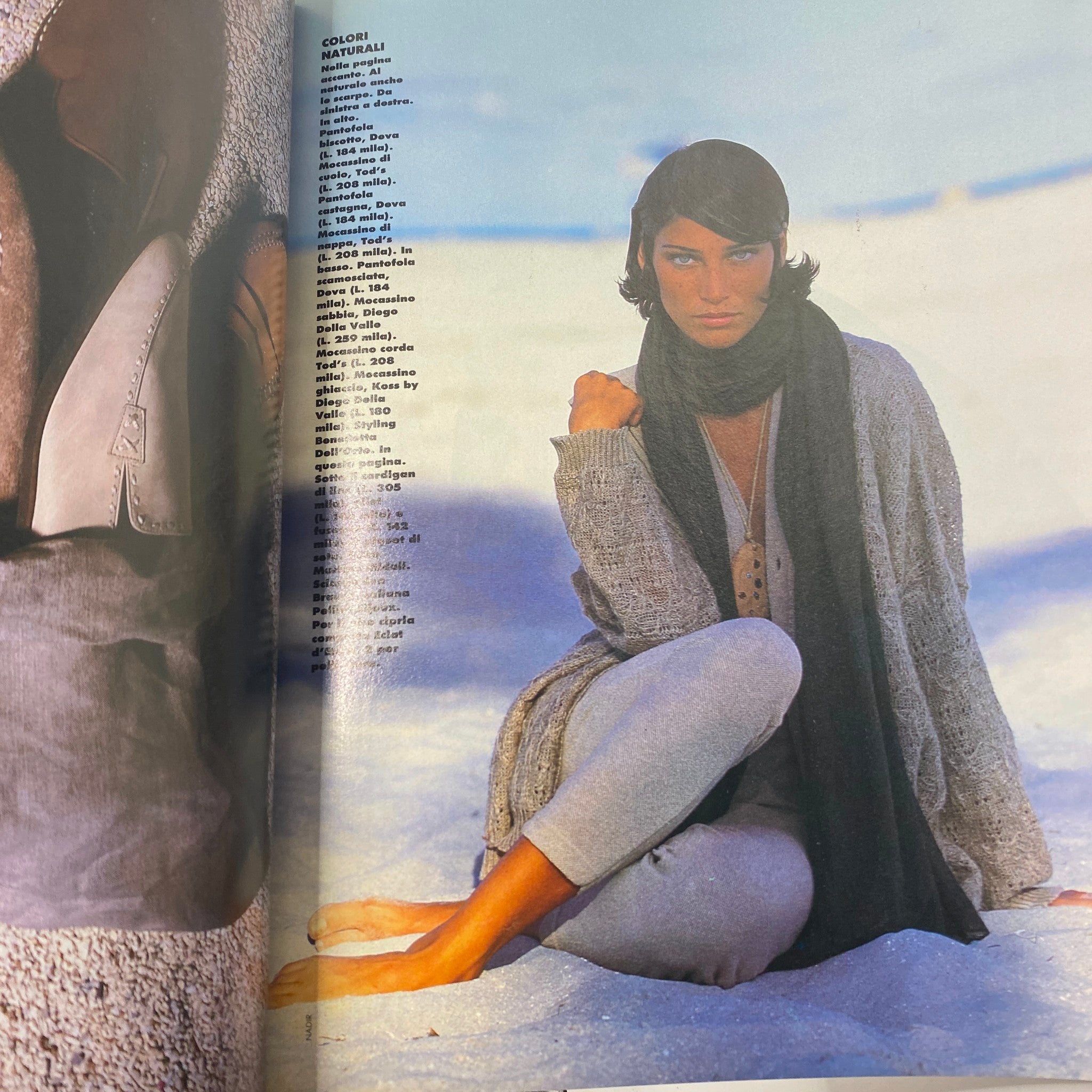 Elle Italia Magazine April 1993 interior page displaying a fashion spread, featuring a model in a natural setting, emphasizing 90s fashion styles.