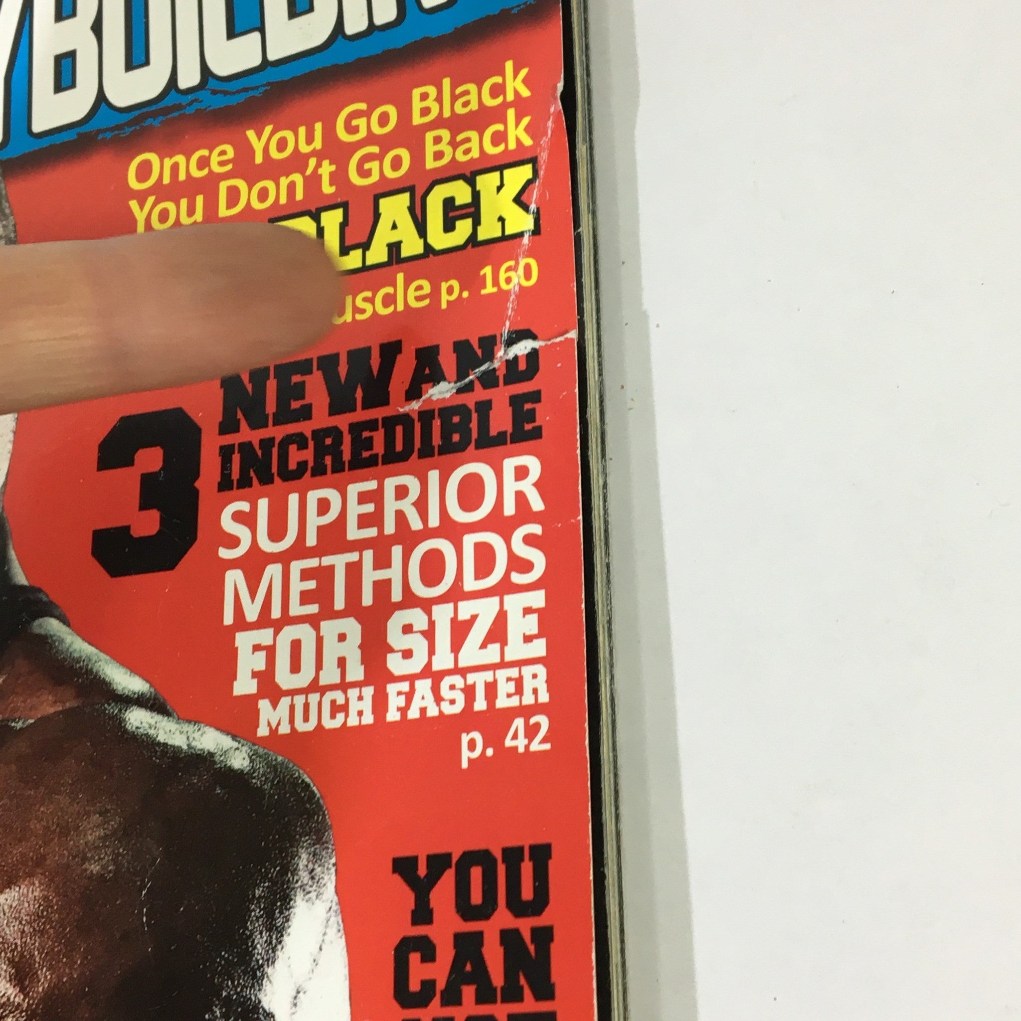 Close-up of the Planet Muscle & Bodybuilding magazine cover, showcasing a headline about superior methods for size, from the September 2011 issue with David Hoffman.
