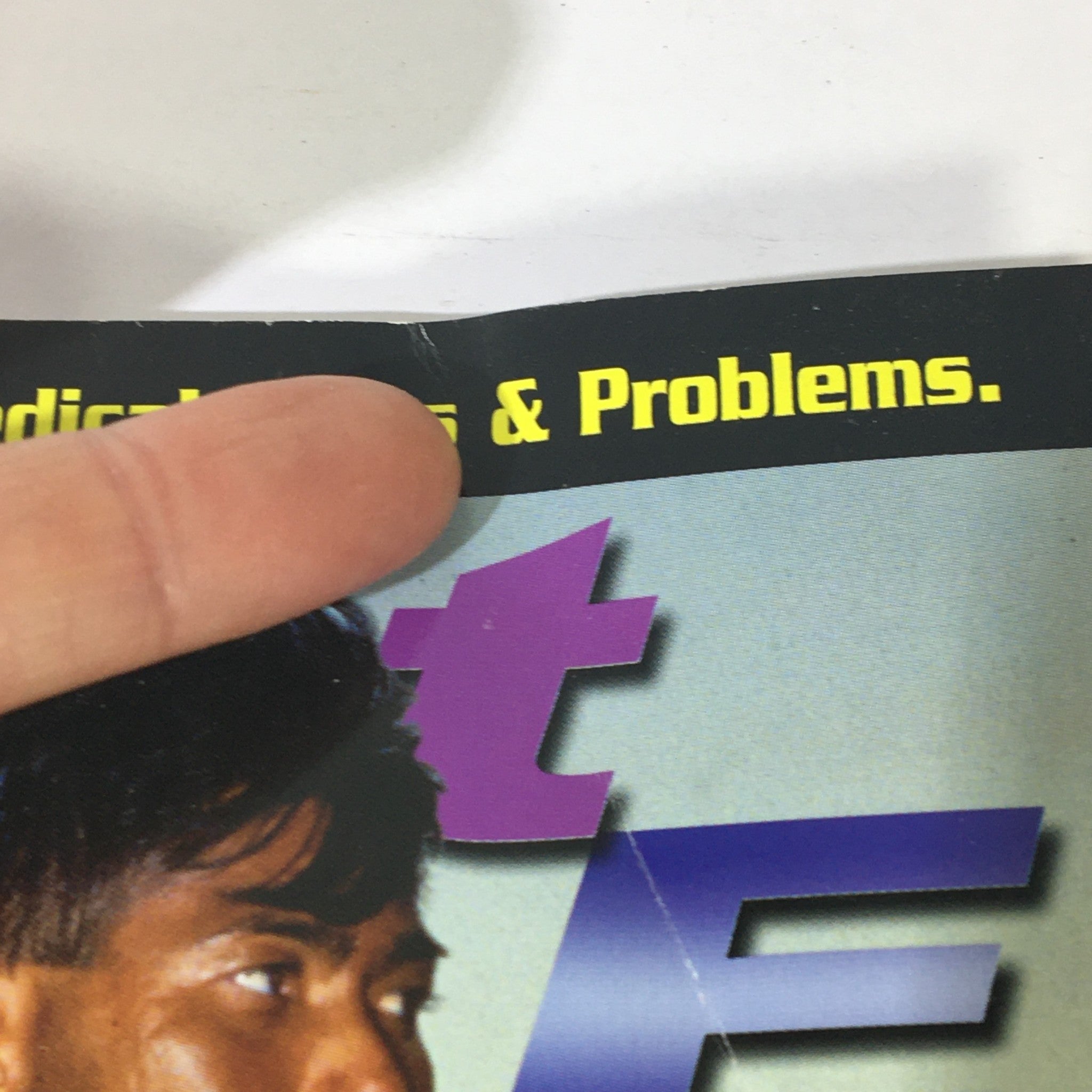 Close-up image of Planet Muscle & Nutrition Magazine August 2002, showing text about steroids, medical tests, and problems along the top edge.