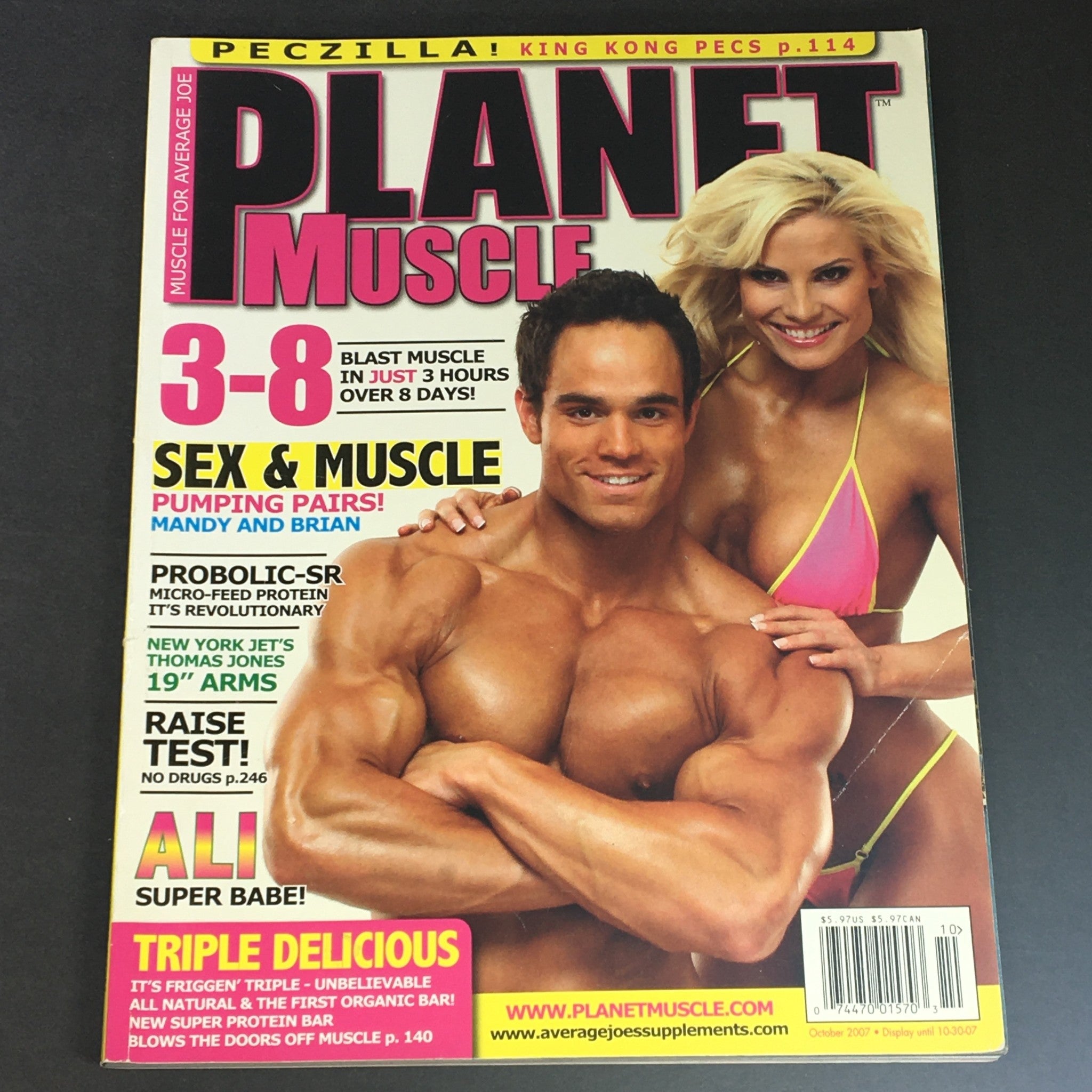 Cover of Planet Muscle Magazine October 2007 featuring Super Babe Ali and New York Jets star Thomas Jones. The cover highlights fitness, beauty, and sports with bold headlines and vibrant imagery.