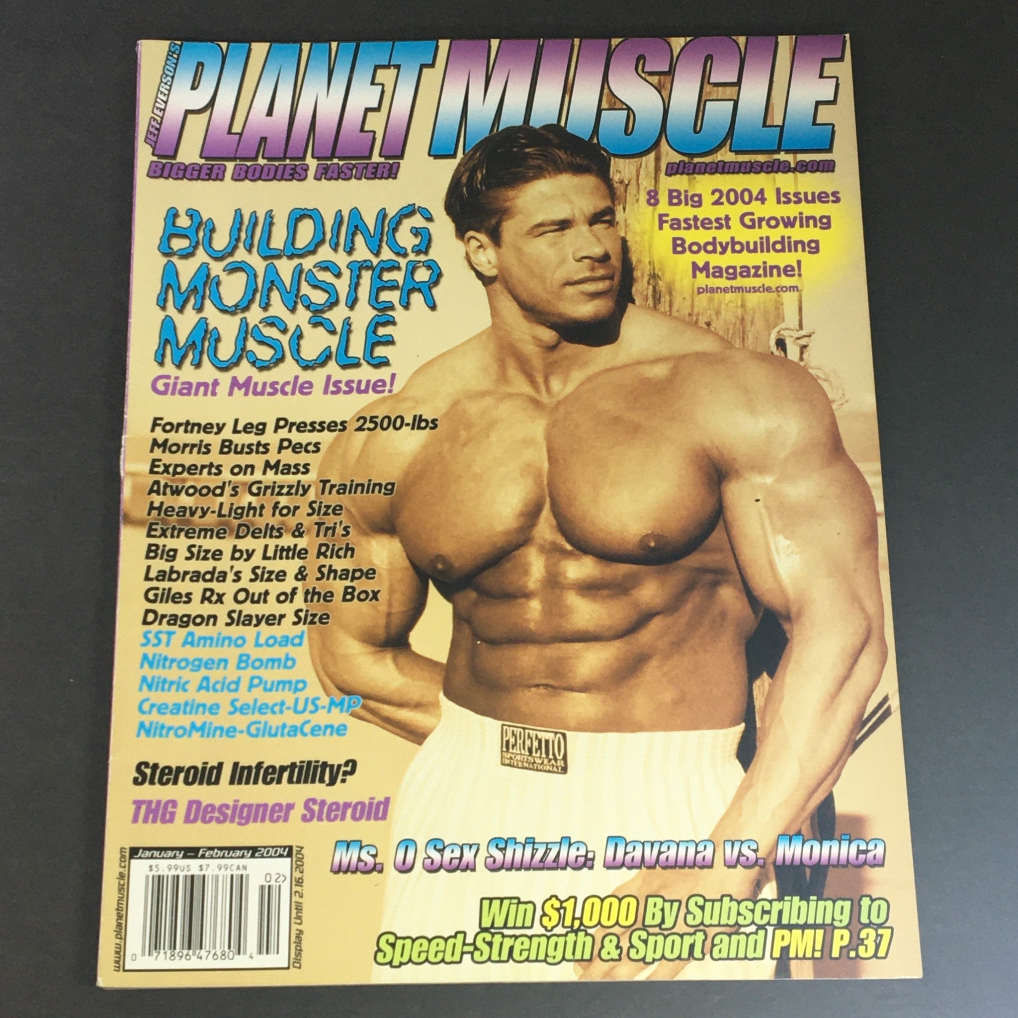 Cover of Planet Muscle Magazine January February 2004 featuring a showdown between Ms. Olympic contenders Davana and Monica, highlighting the theme of bodybuilding and muscle building.