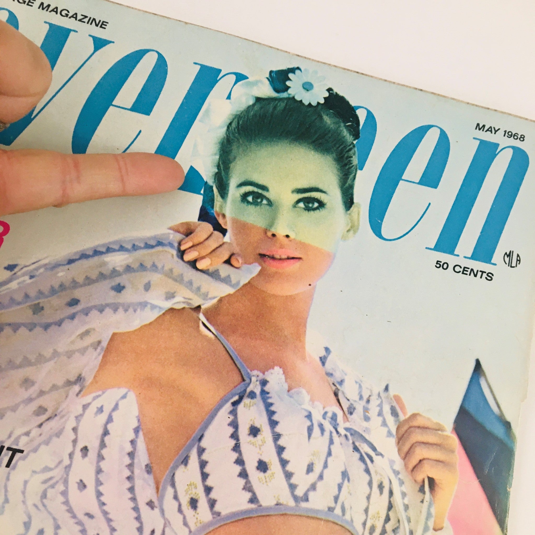 Cover of Seventeen Magazine May 1968 showcasing a model in vintage fashion, featuring intricate patterns and vibrant colors, highlighting the iconic style of the era.
