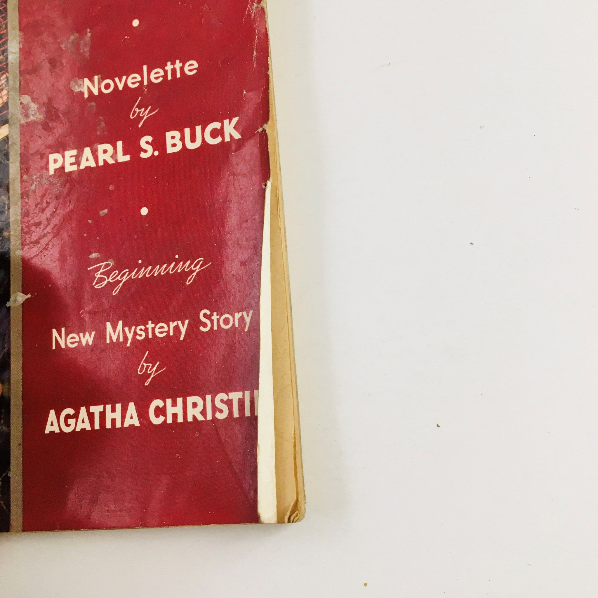 Details from Redbook Magazine September 1936 showing the novelette by Pearl S. Buck and a new mystery story by Agatha Christie, reflecting the era's literary contributions.